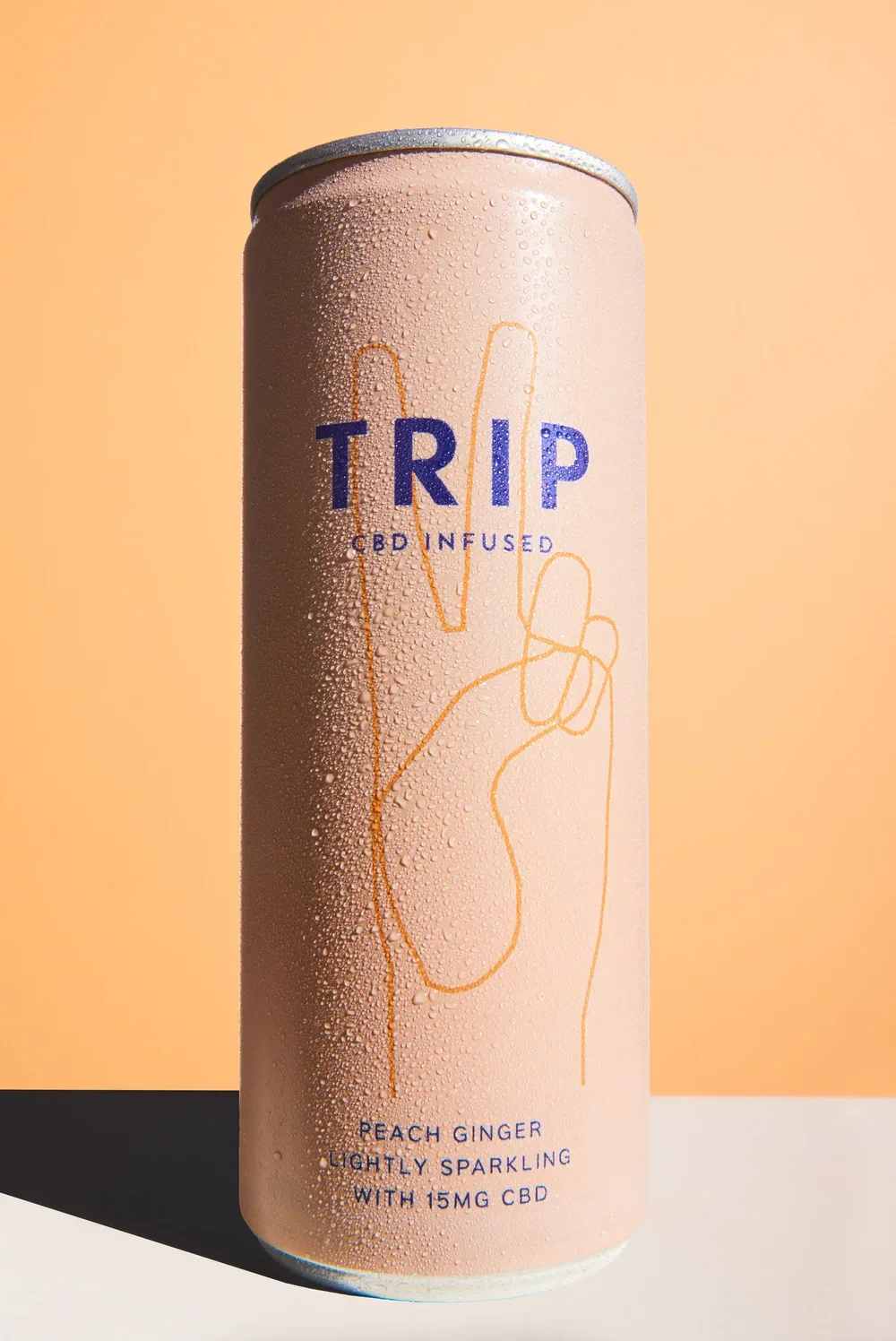 TRIP functional drink — orange flavour, commercial photography by Wayne Lennon