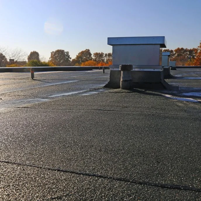 Epic Roofing commercial roof coating restoration in South Louisiana