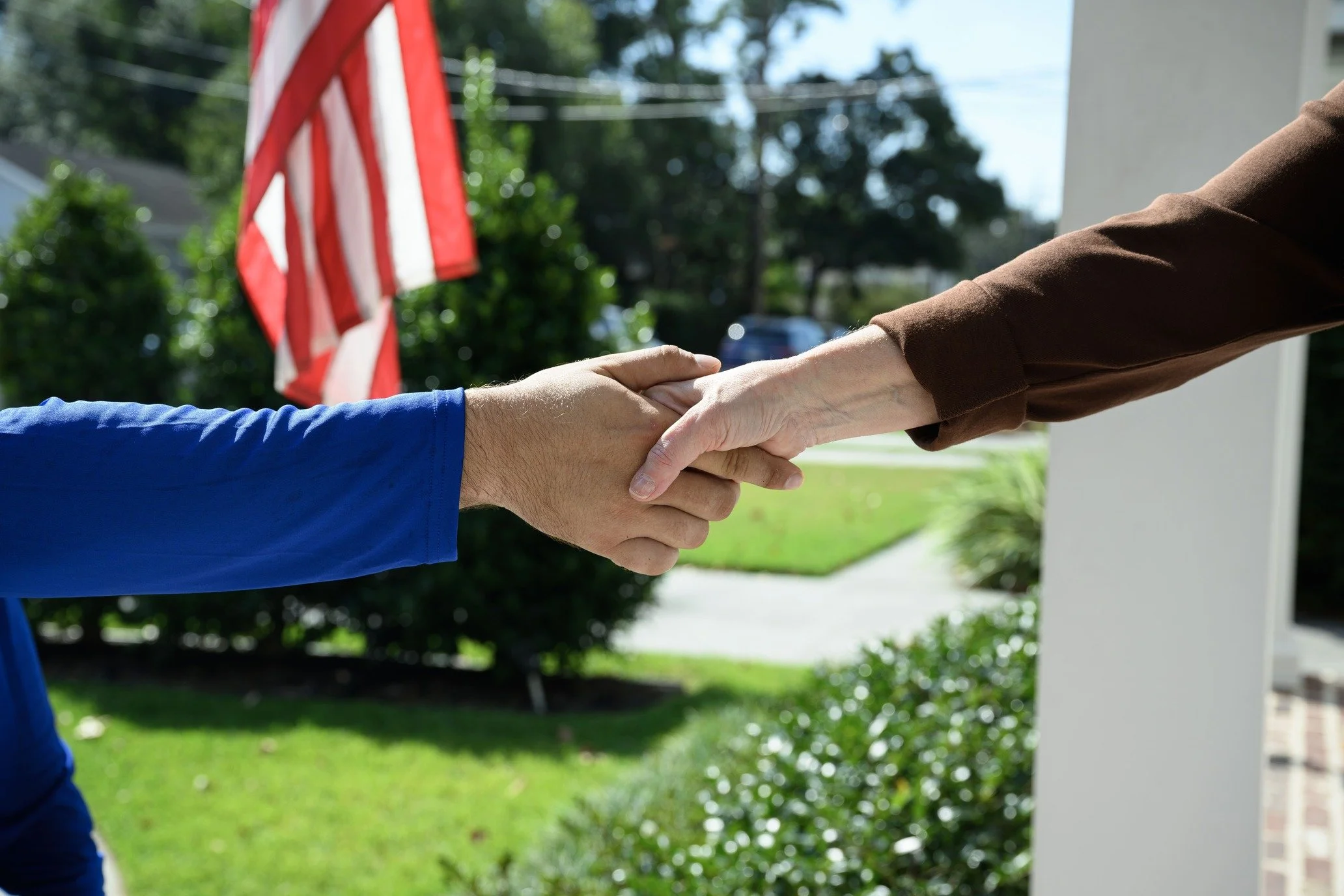 Epic Roofing handshake with a Metairie homeowner, Jefferson Parish