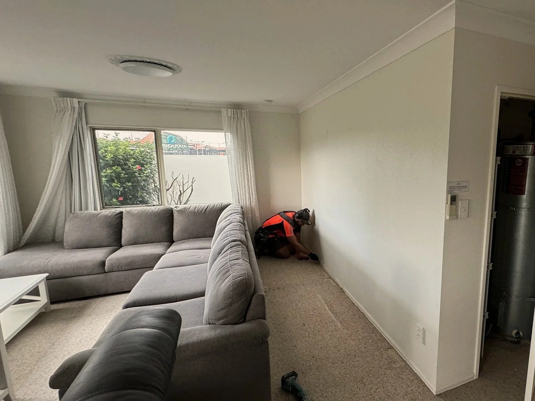 Work in progress in the living area during apartment refurbishment, Tauranga