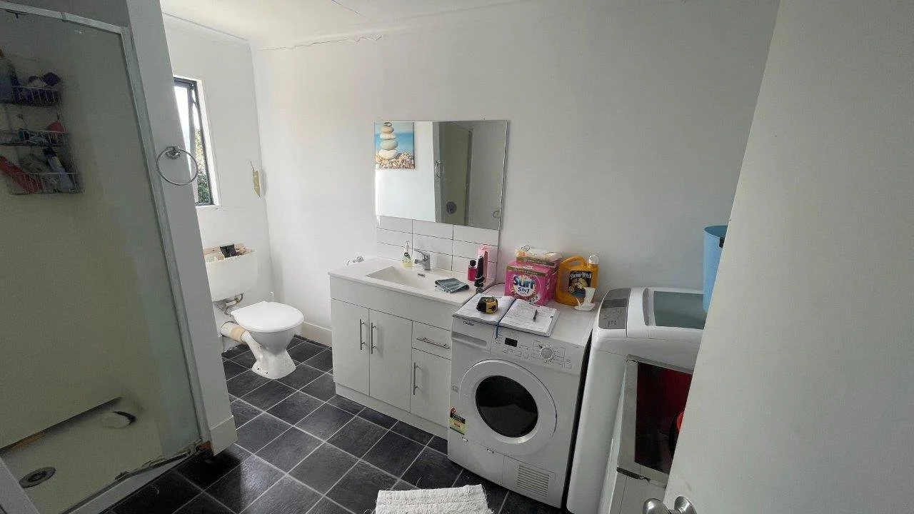 Bathroom before insurance repair, Tauranga