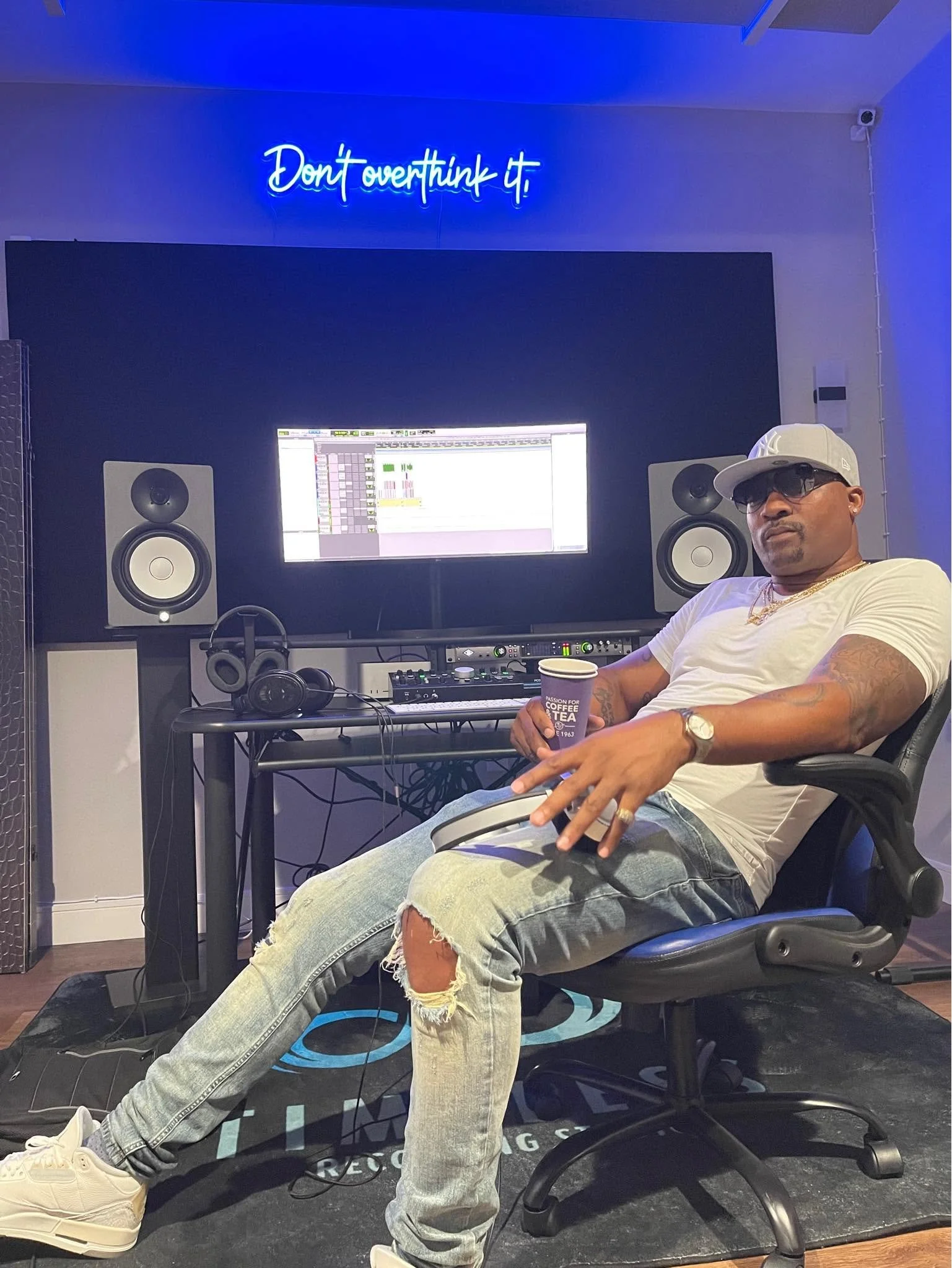 Ripcord seated inside a recording studio