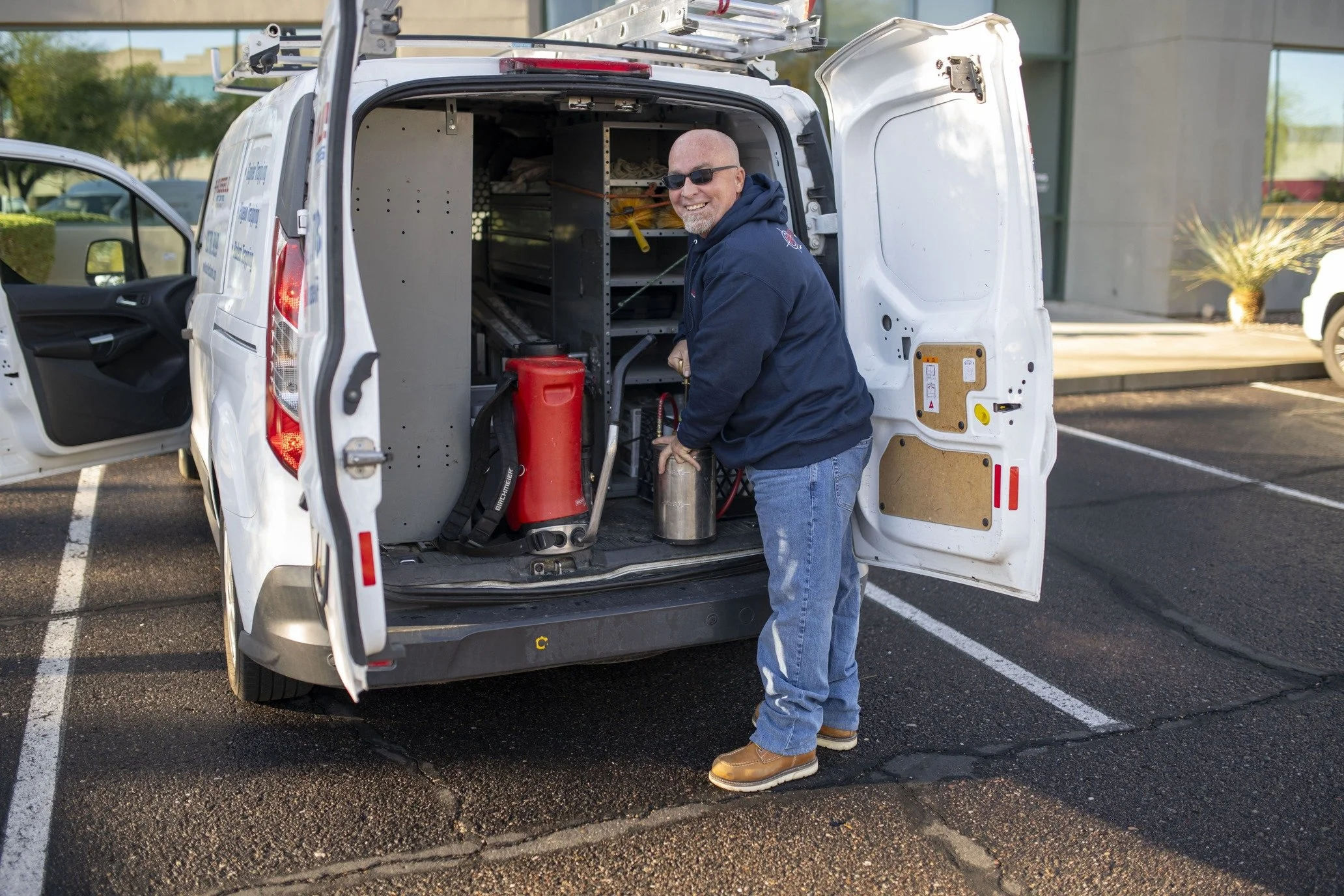 Russell Pest Control technician serving Tempe, Arizona properties