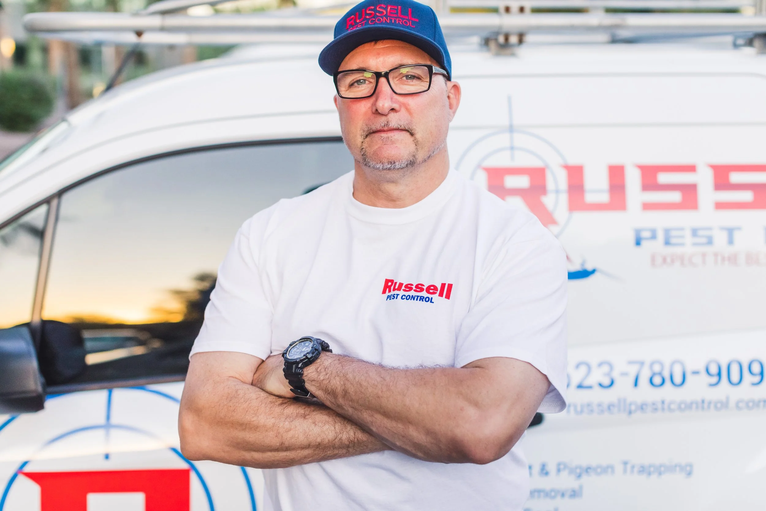 Russell Pest Control technician setting targeted traps on runways