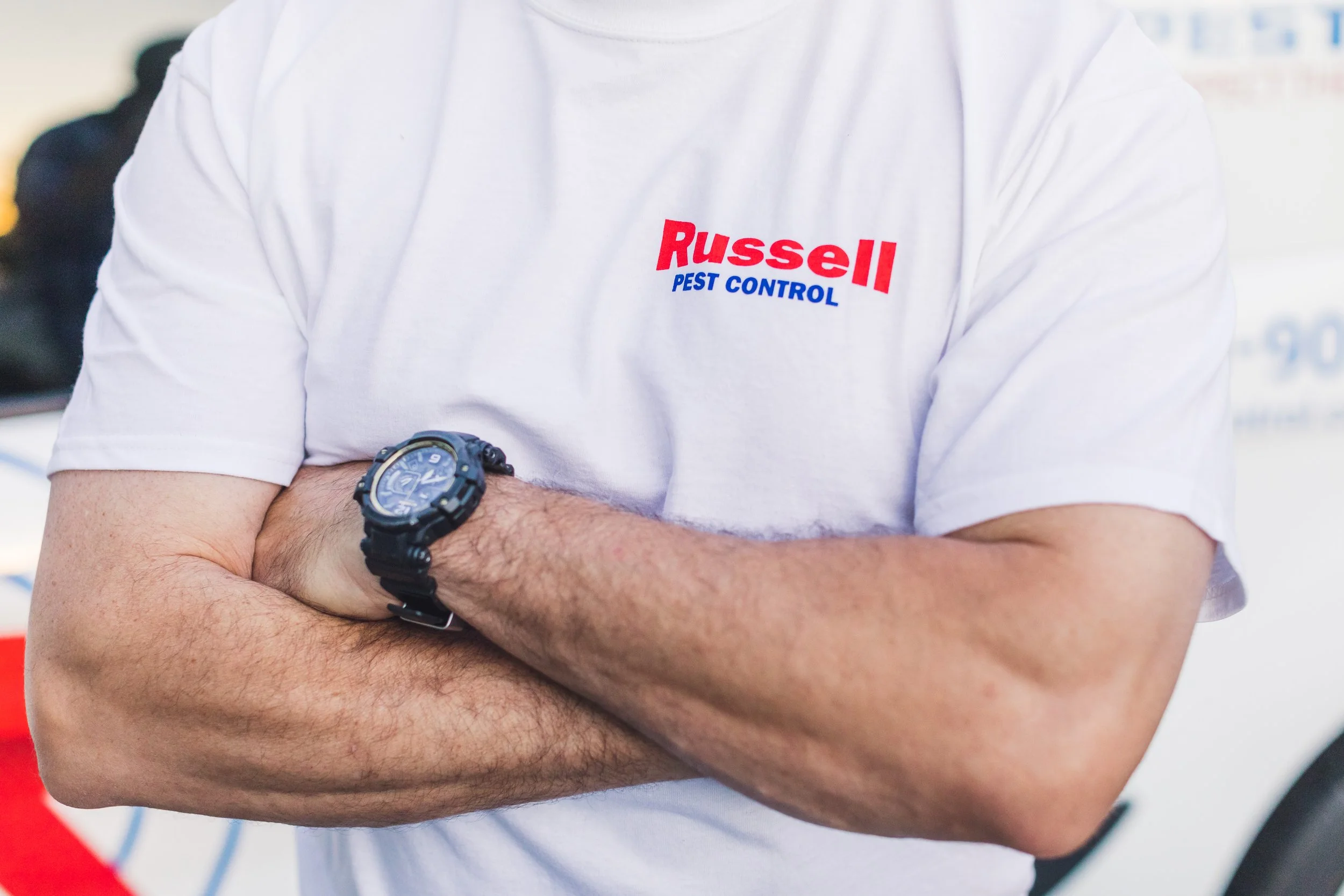Russell Pest Control team member performing home sealing entry checks