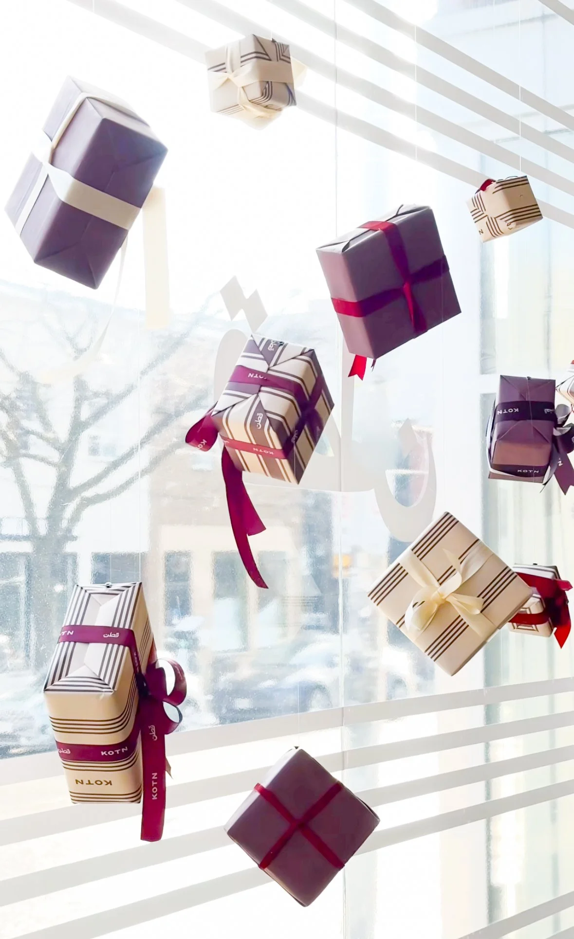Wrapped gifts in a retail store window activation