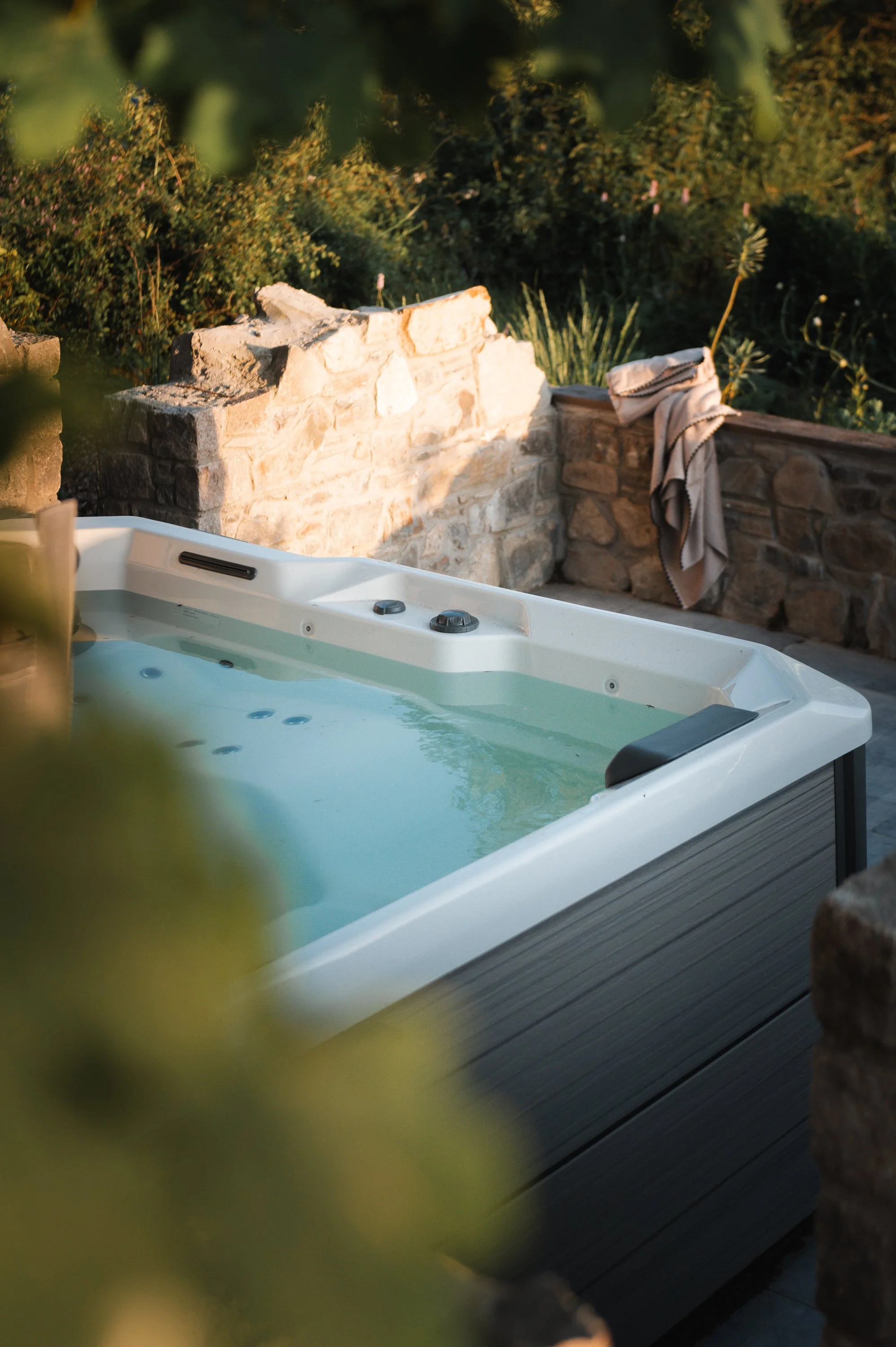 The hot tub, set in the old cottage ruins