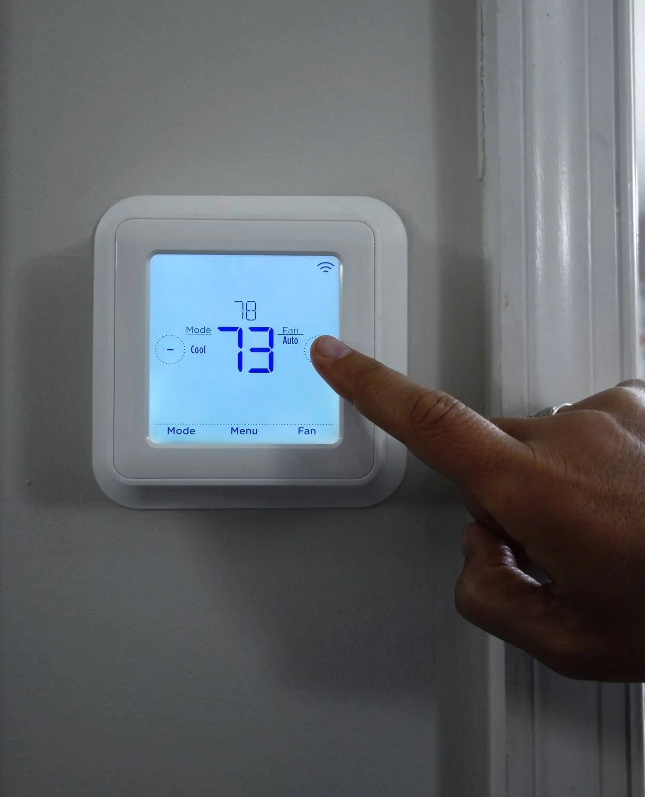 Augie walking a Fort Worth family through their new thermostat