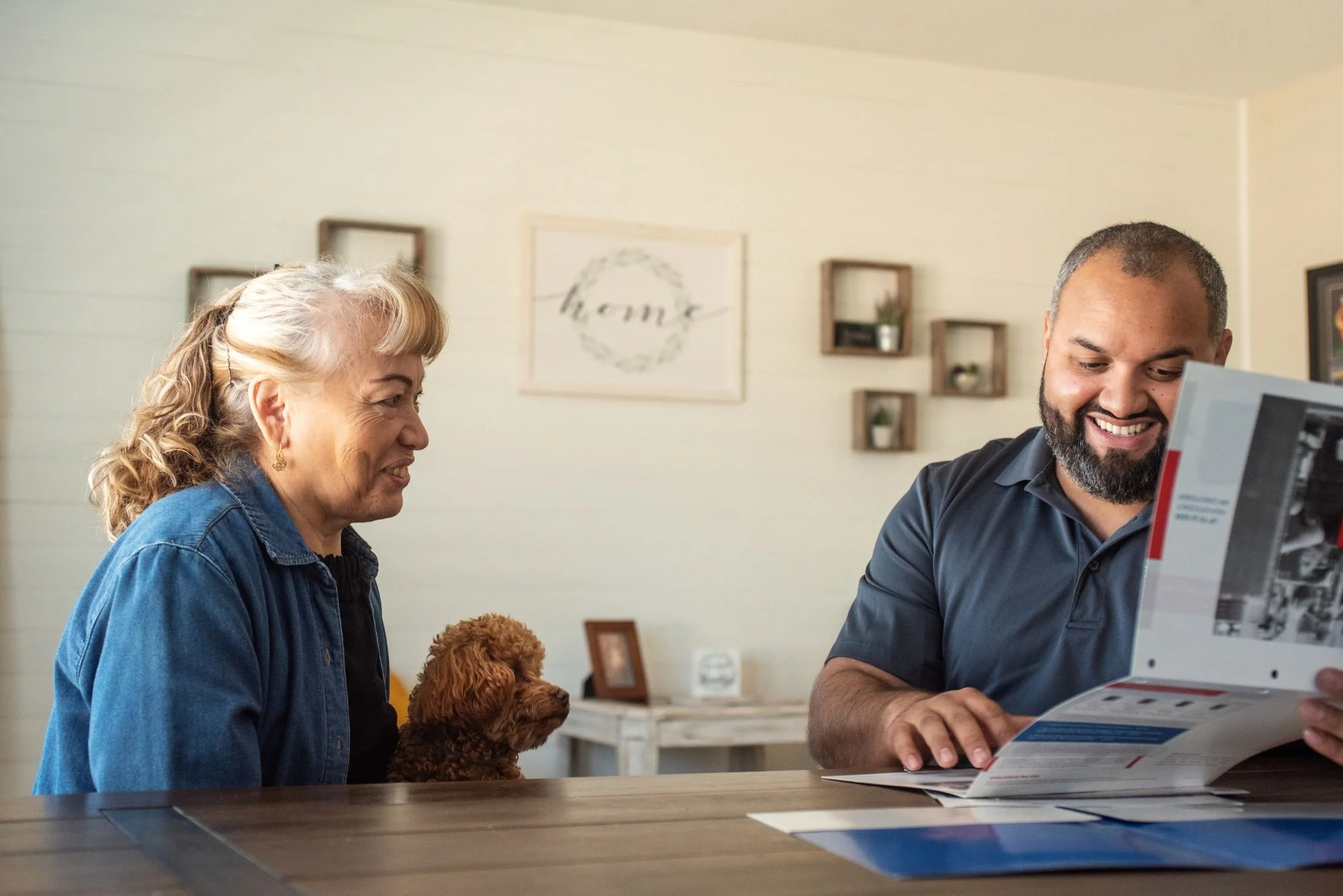 Augie reviewing an estimate with a Fort Worth homeowner