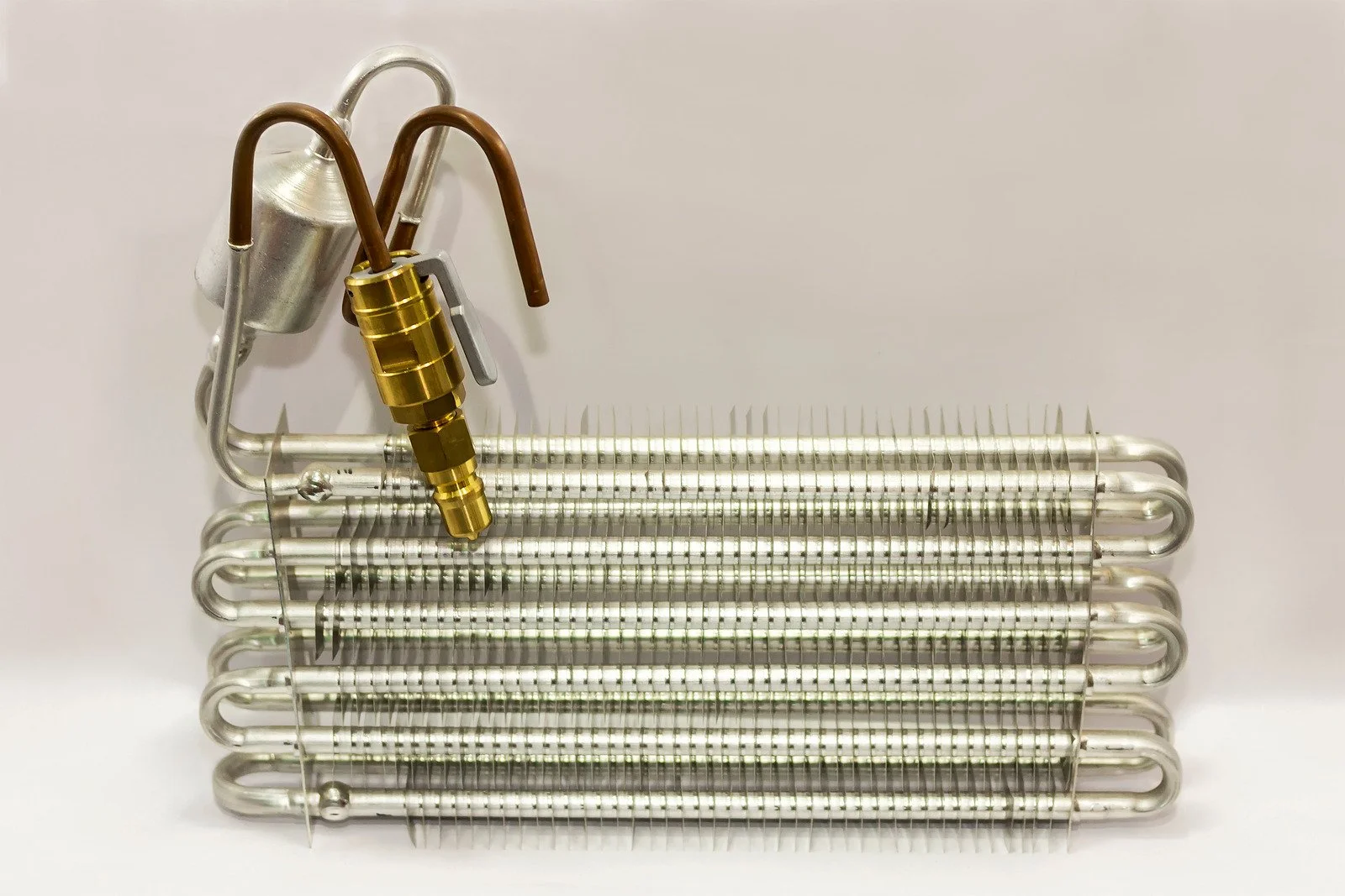 Technician working on a evaporator coil
