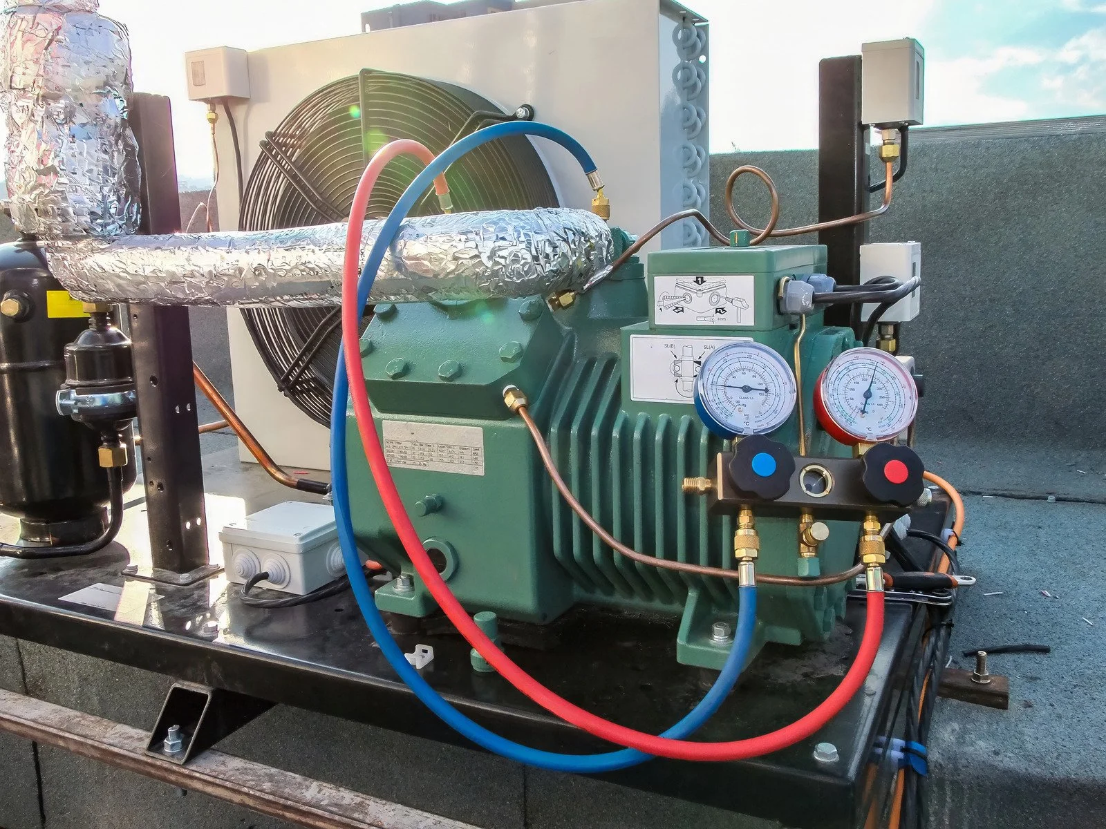 Fix My Air DFW technicians servicing commercial HVAC equipment in Fort Worth