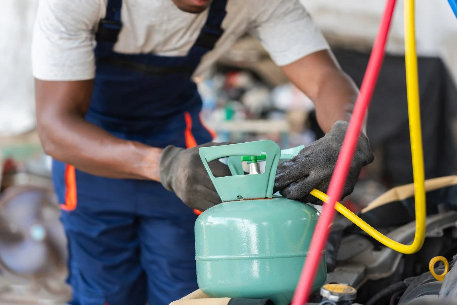 Fix My Air DFW technician working on a refrigerant leak at a Fort Worth home
