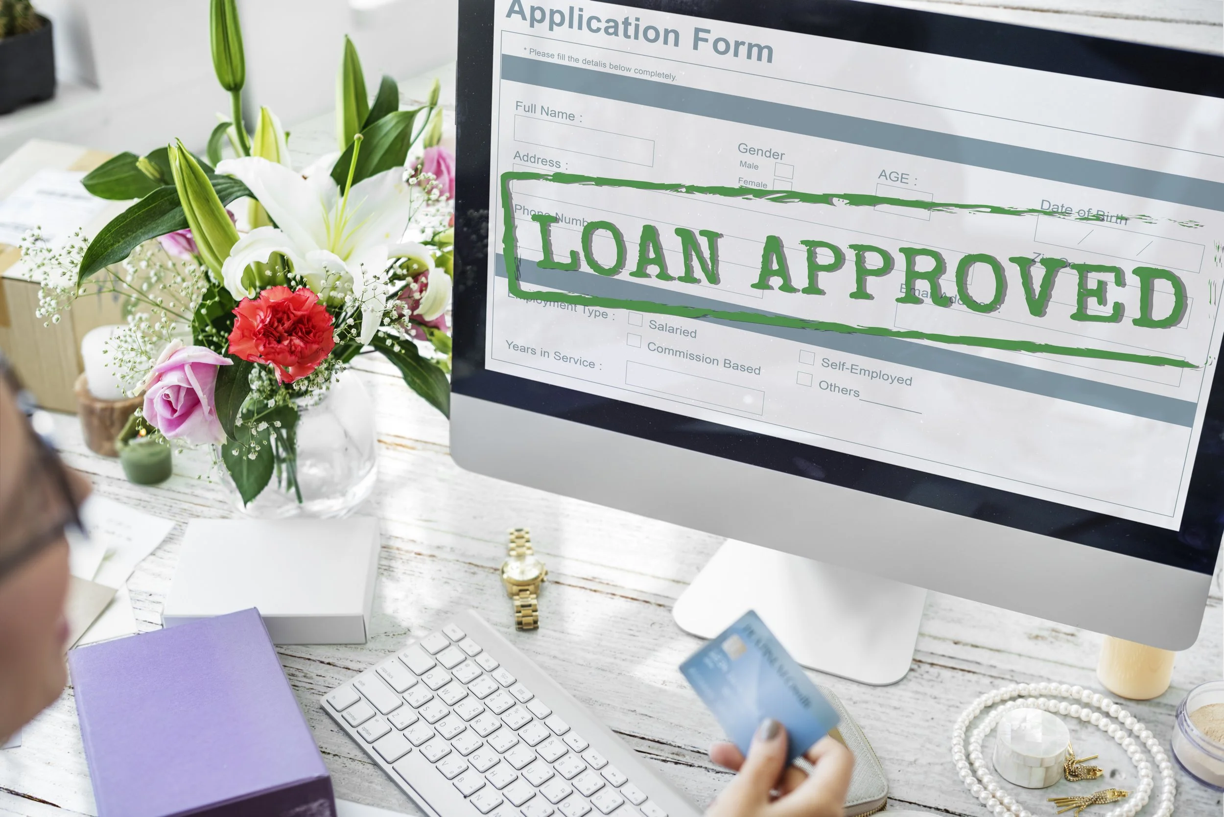 Woman applying for online loan on smartphone