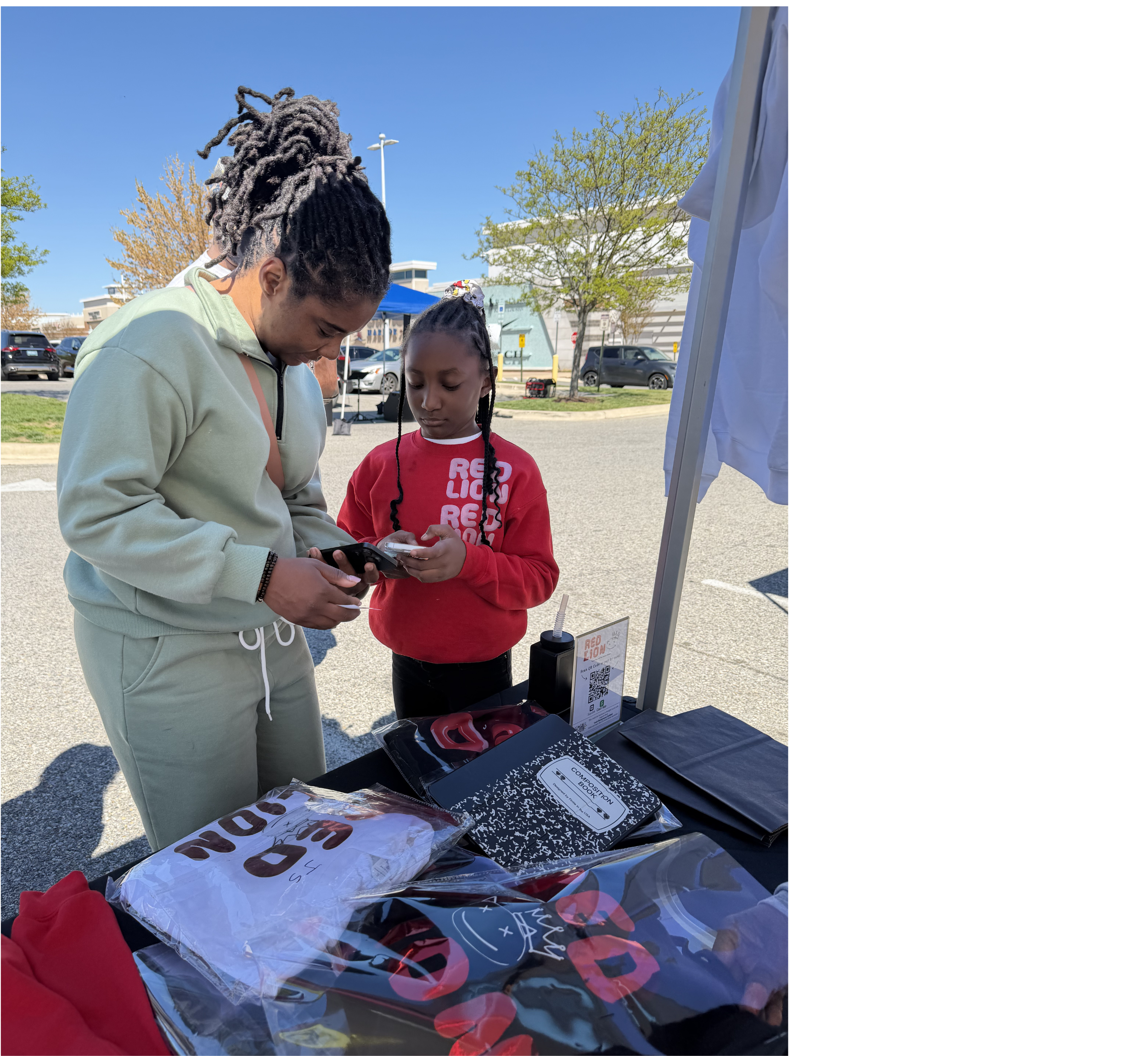 Students selling products at a youth pop-up shop