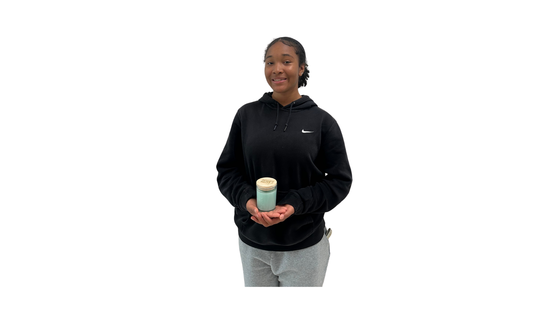 Raniyah holding Blue Dreams candle