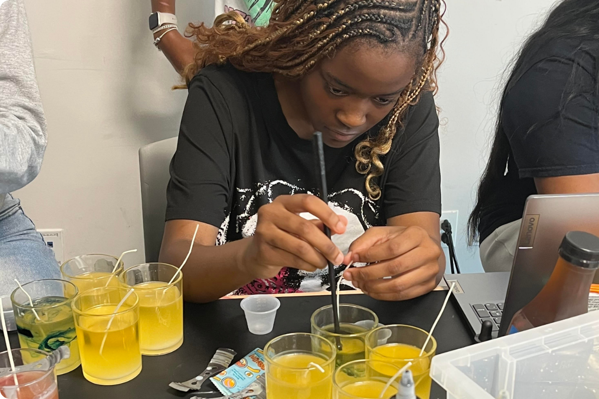 Youth participating in hands-on YEI programming