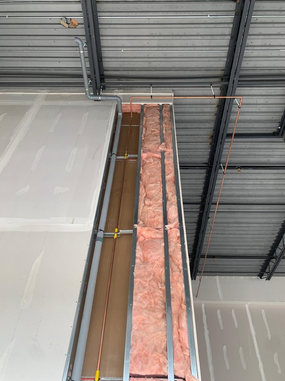 Copper rough-in on a commercial wall by Seal Plumbing