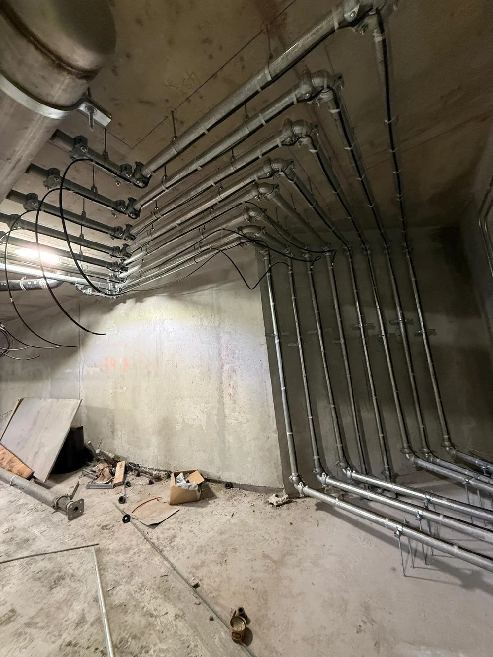 Underground drain trench in a commercial unit by Seal Plumbing