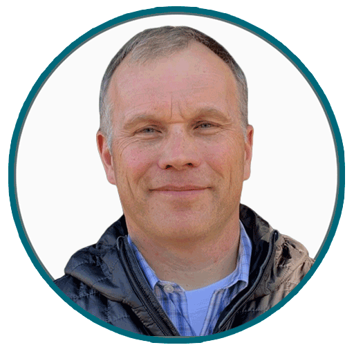 Headshot of Carter Fenton, Senior Sales Specialist at Codon Learning, with a white background and torquise outline