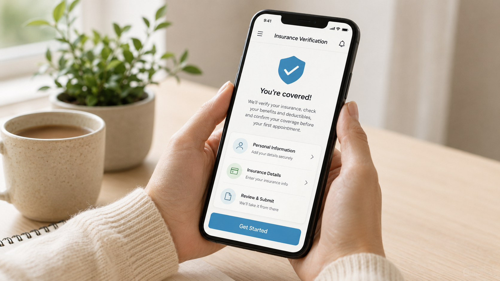 Hand holding a phone showing an insurance verification app