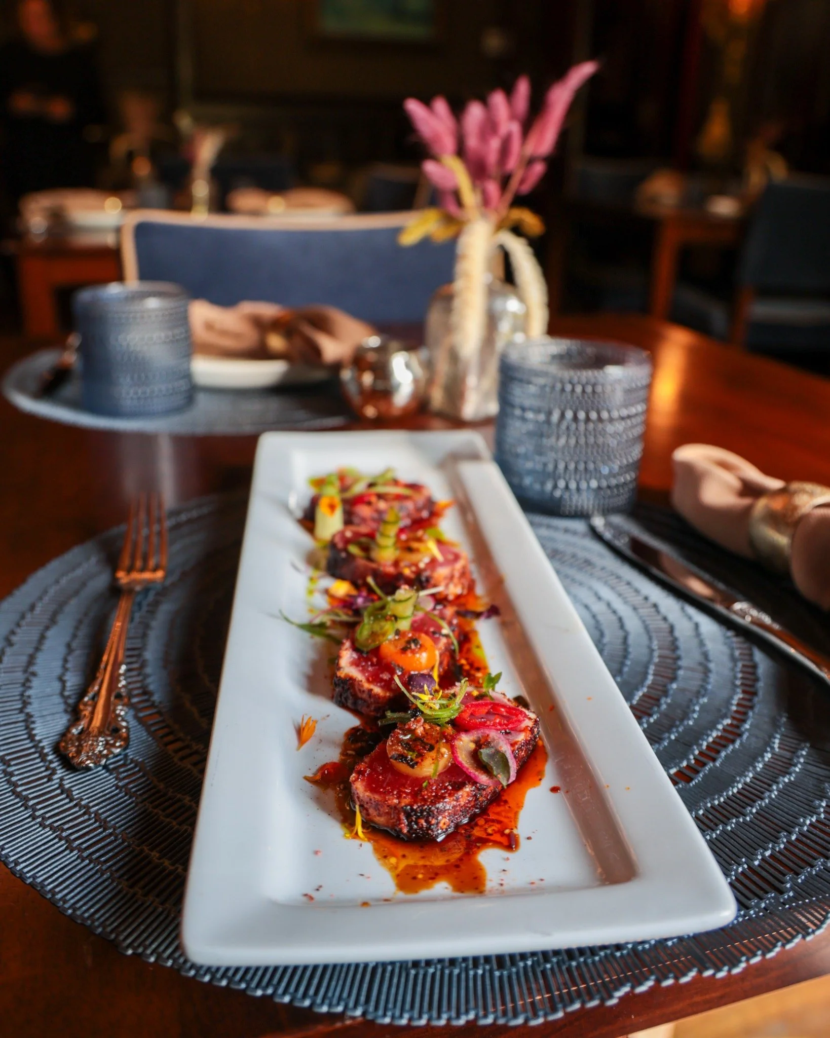 Seared tuna with cherry tomatoes and jalape&ntilde;o at Bohemia Detroit.