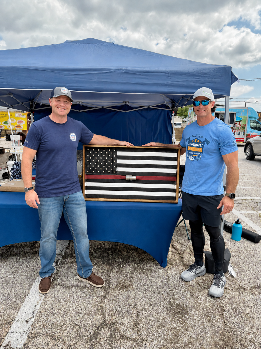 Photograph of the actual 24 by 40 inch handcrafted American flag made from fire hose by Custom FireFlags