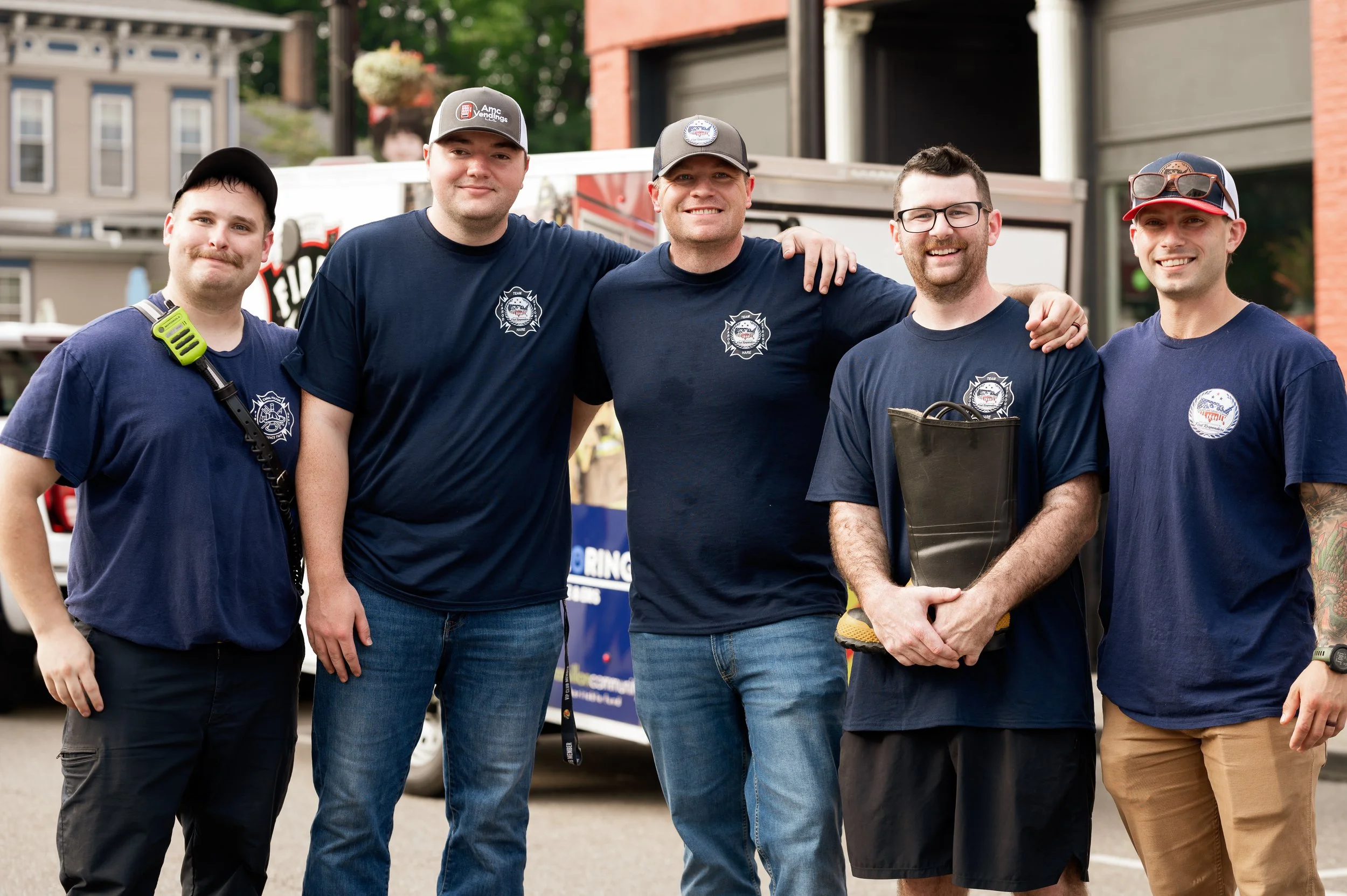 First responders standing with the Hare family at Hare Strong