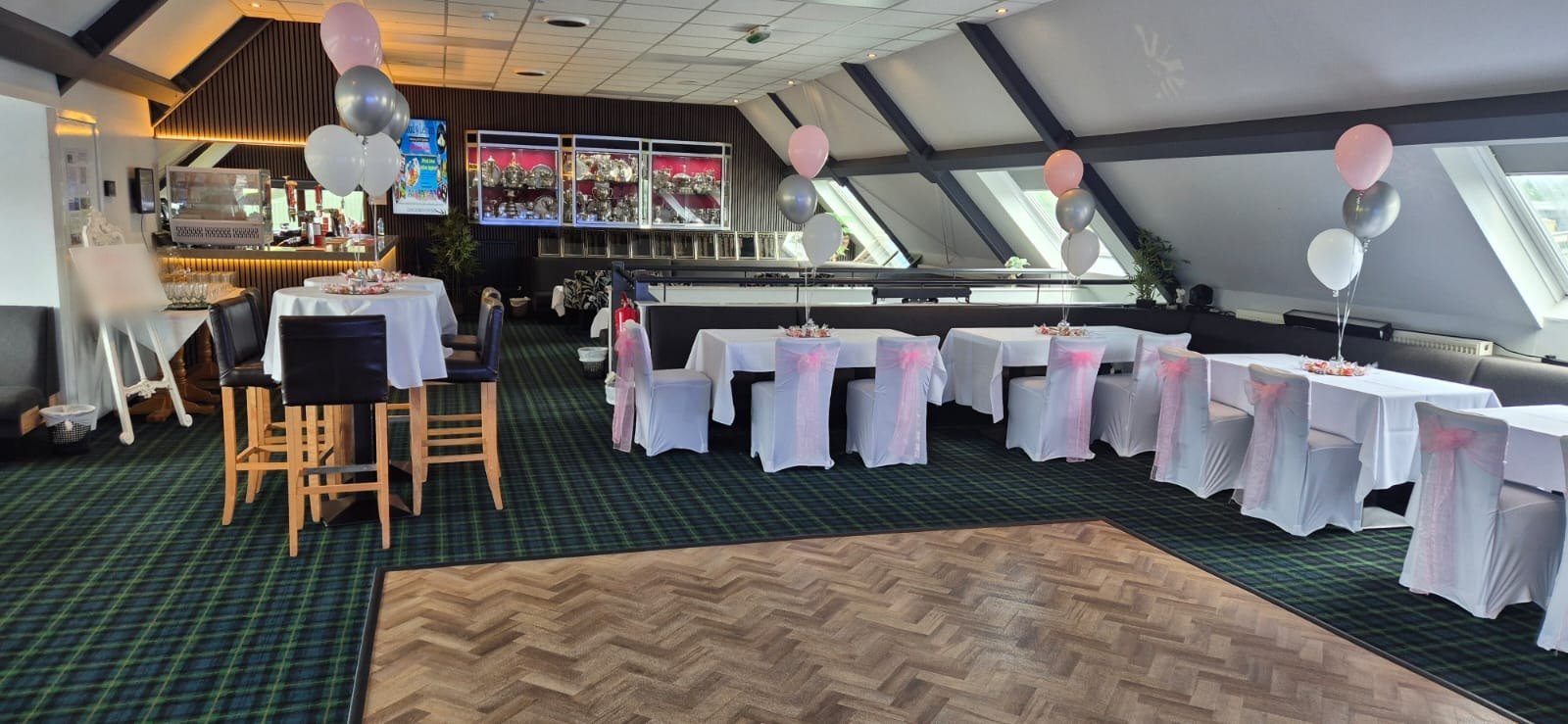 The 1905 Bar at Blyth Golf Club set for a private party, with dressed tables and a dance floor