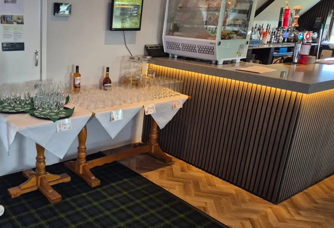 Welcome drinks laid out on tables beside the 1905 Bar counter