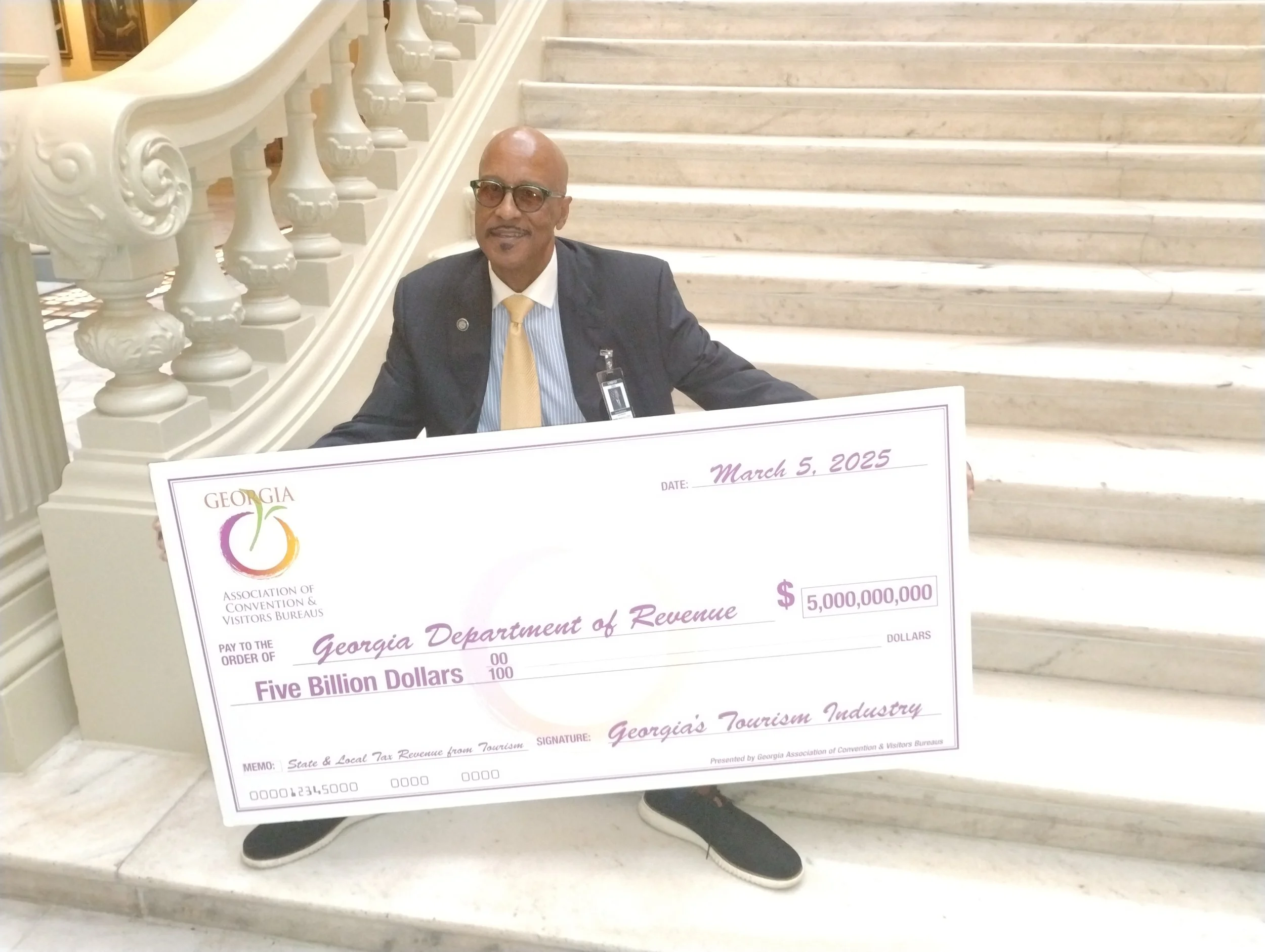 Lance Robertson $5 Billion Tourism Check Capitol Steps