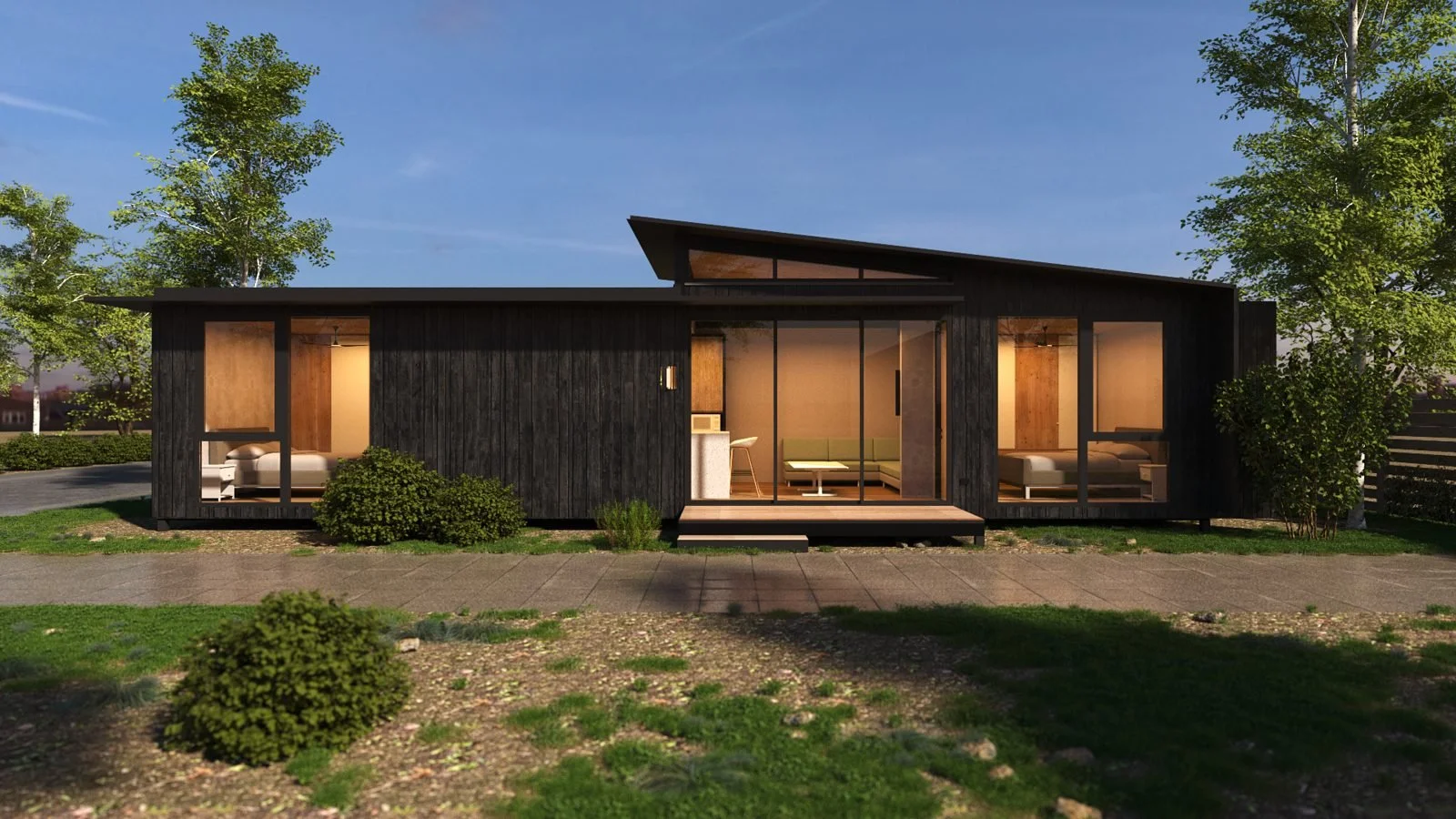 Freedom 60 exterior: dark vertical cladding, skillion roof and glazed living room opening to a timber deck.