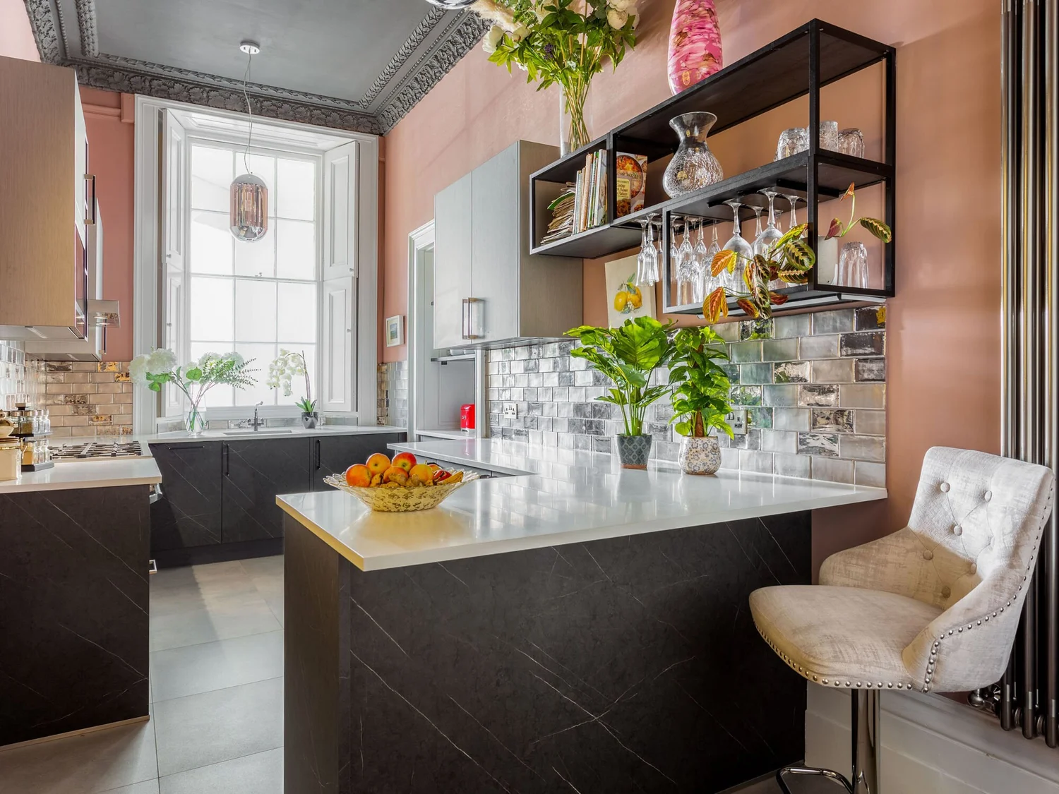 Renovated Bristol Mansions kitchen with a Minerva worktop, silver tiles and Regency window and cornice