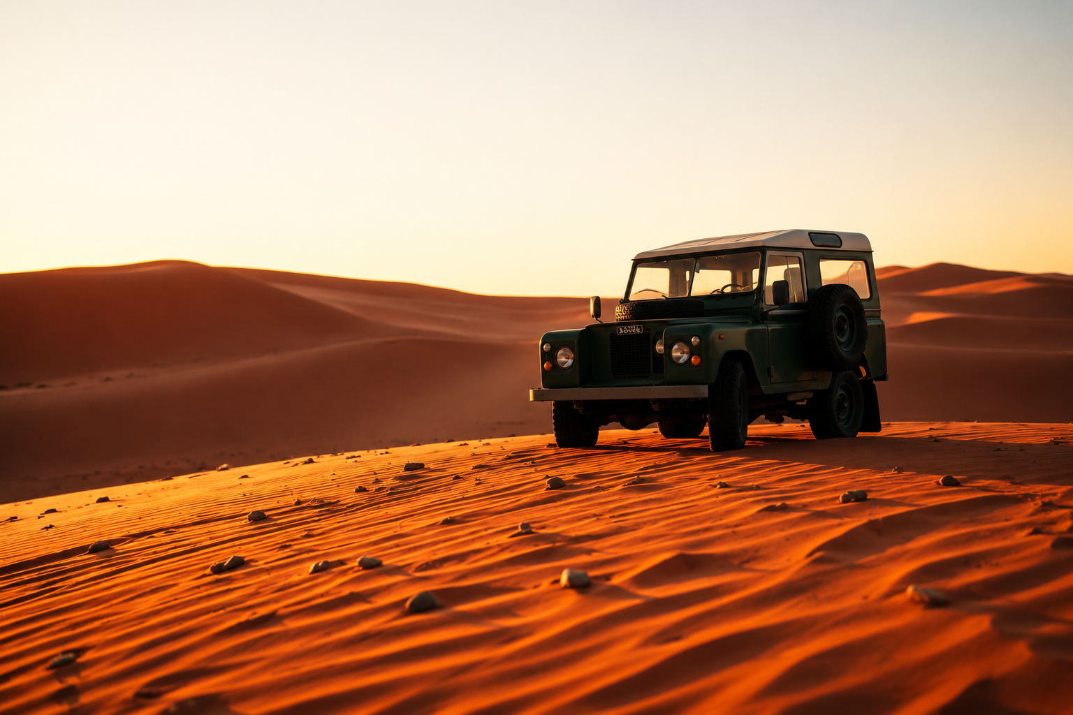 Luxury safari vehicle on red dunes in Namibia