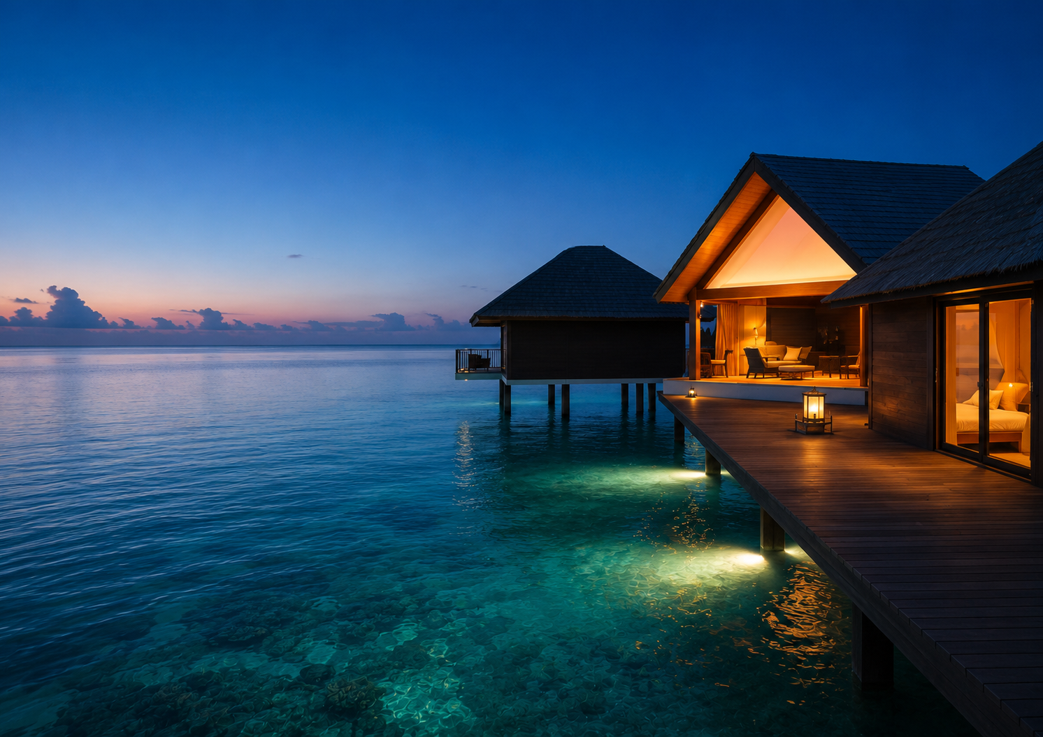 Overwater villa in Baa Atoll Maldives at night