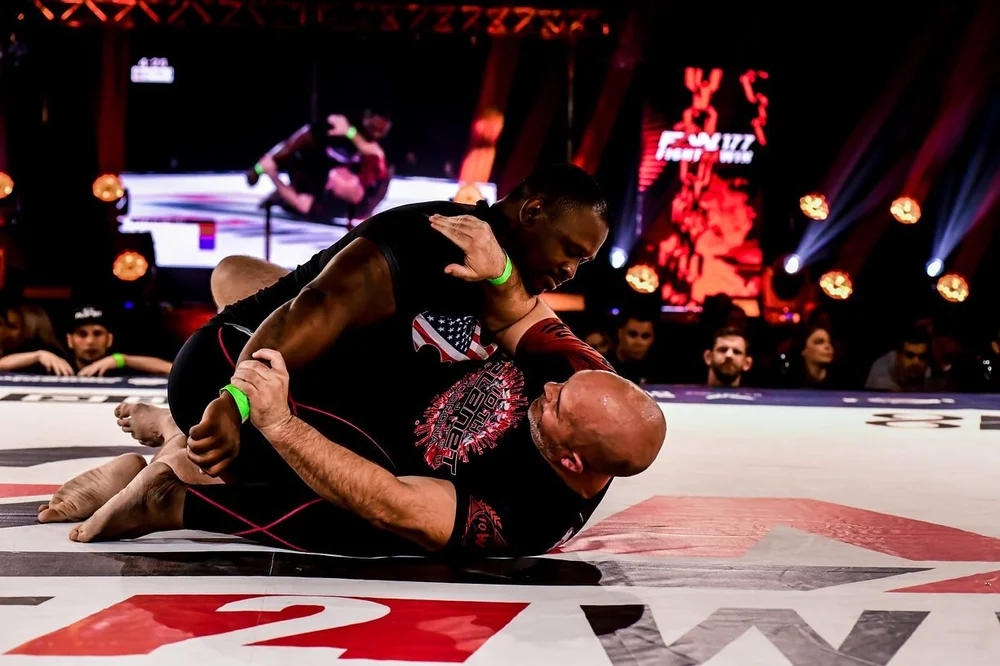 Rod Henderson competing in a grappling match at Fight to Win 177