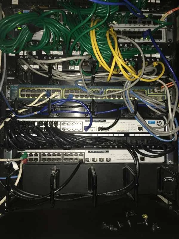 Network rack with switches and patch cables installed by Smartkinect