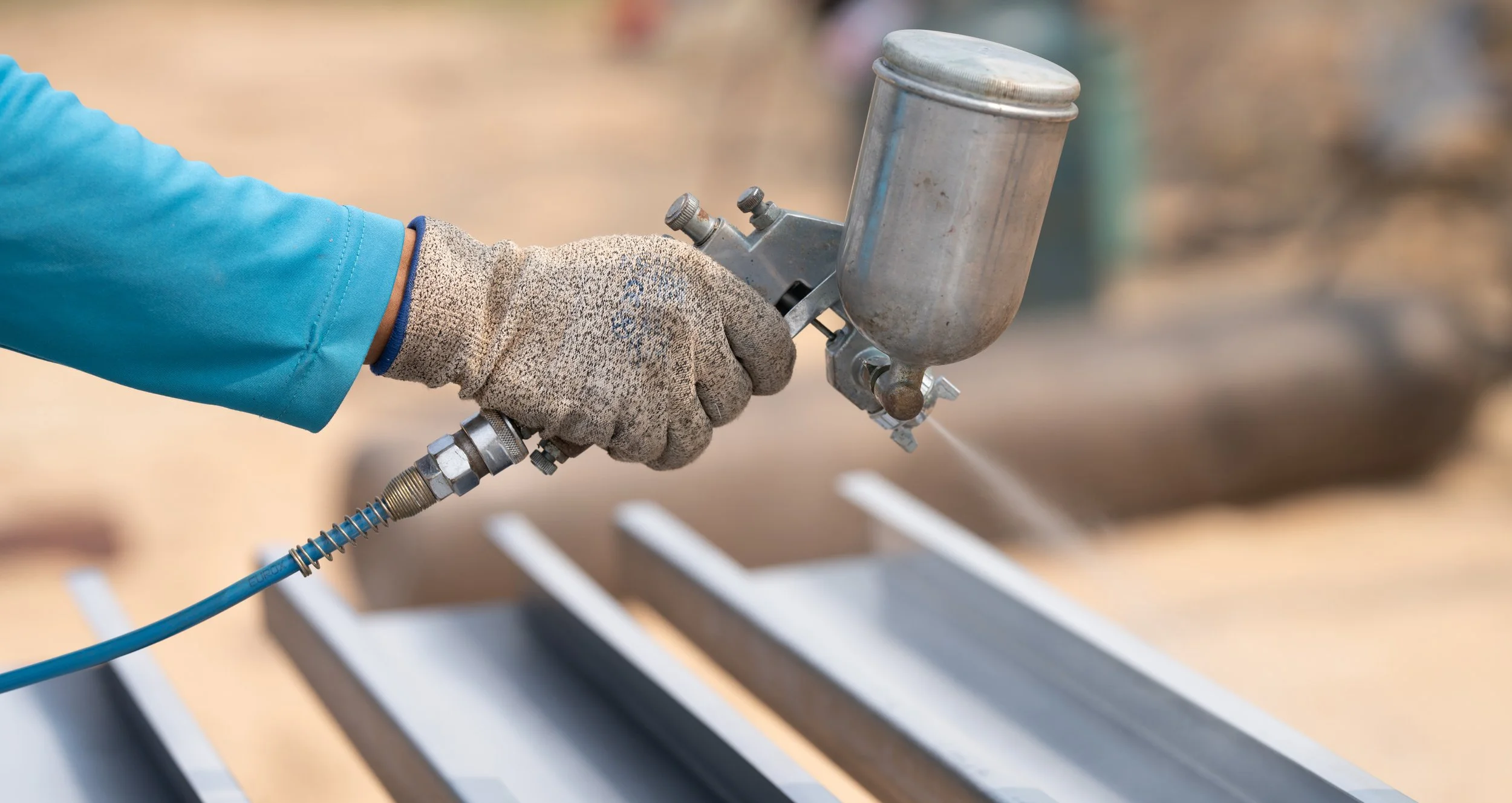 Specialist applicator working on a live project