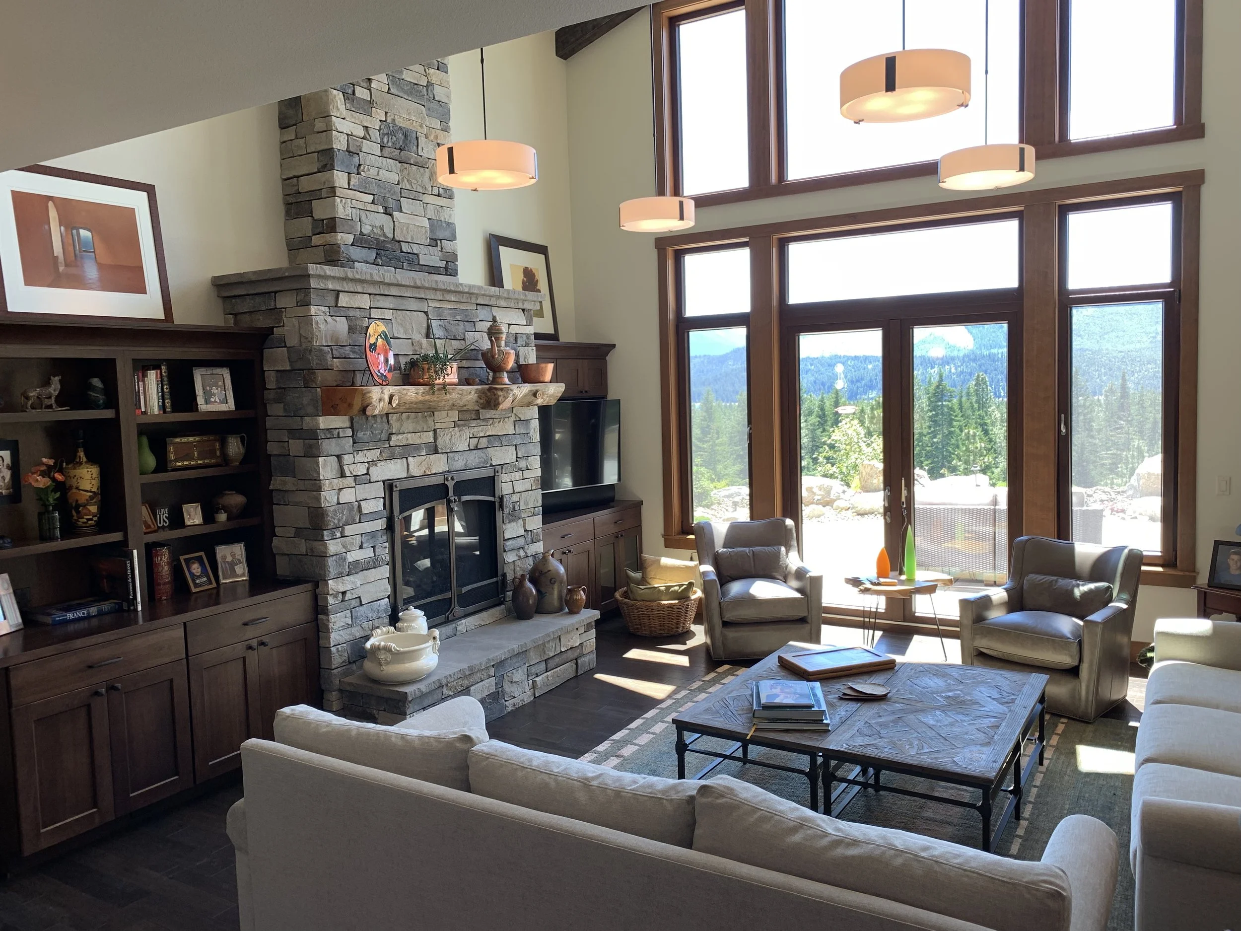 Living room with stone fireplace