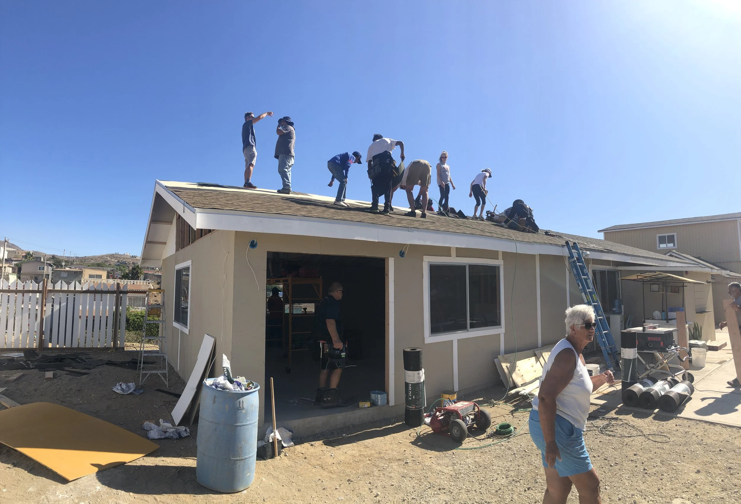 Family receiving keys to new home
