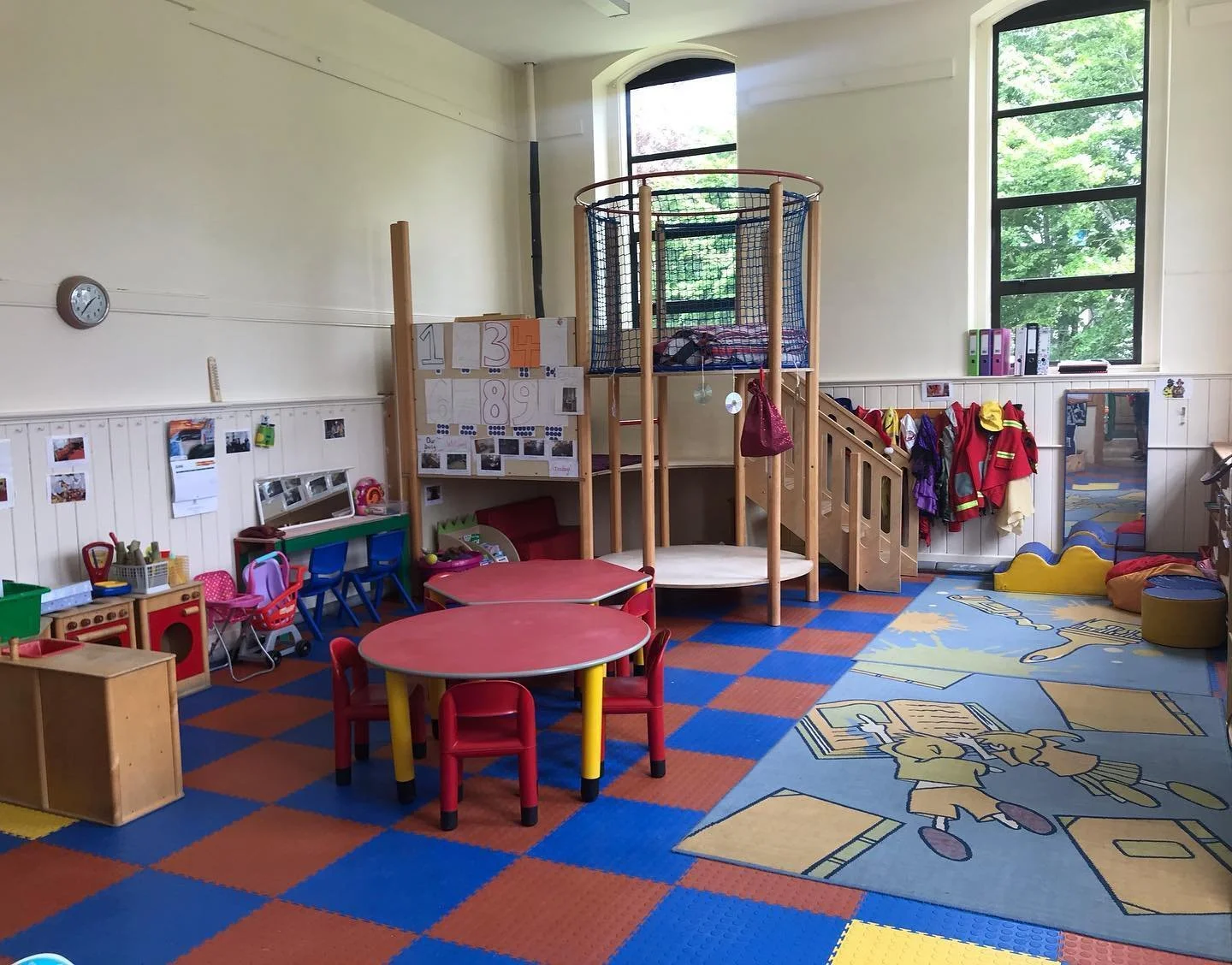 Bright preschool room with climbing frame