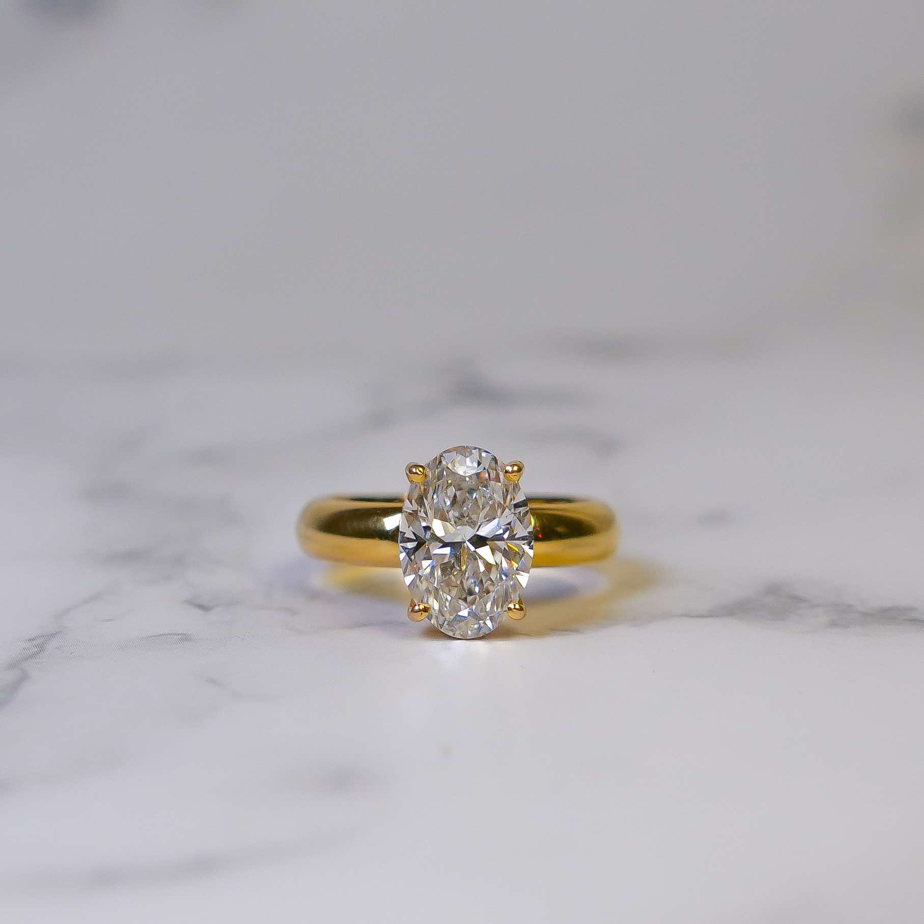 Oval cut lab-grown diamond engagement ring