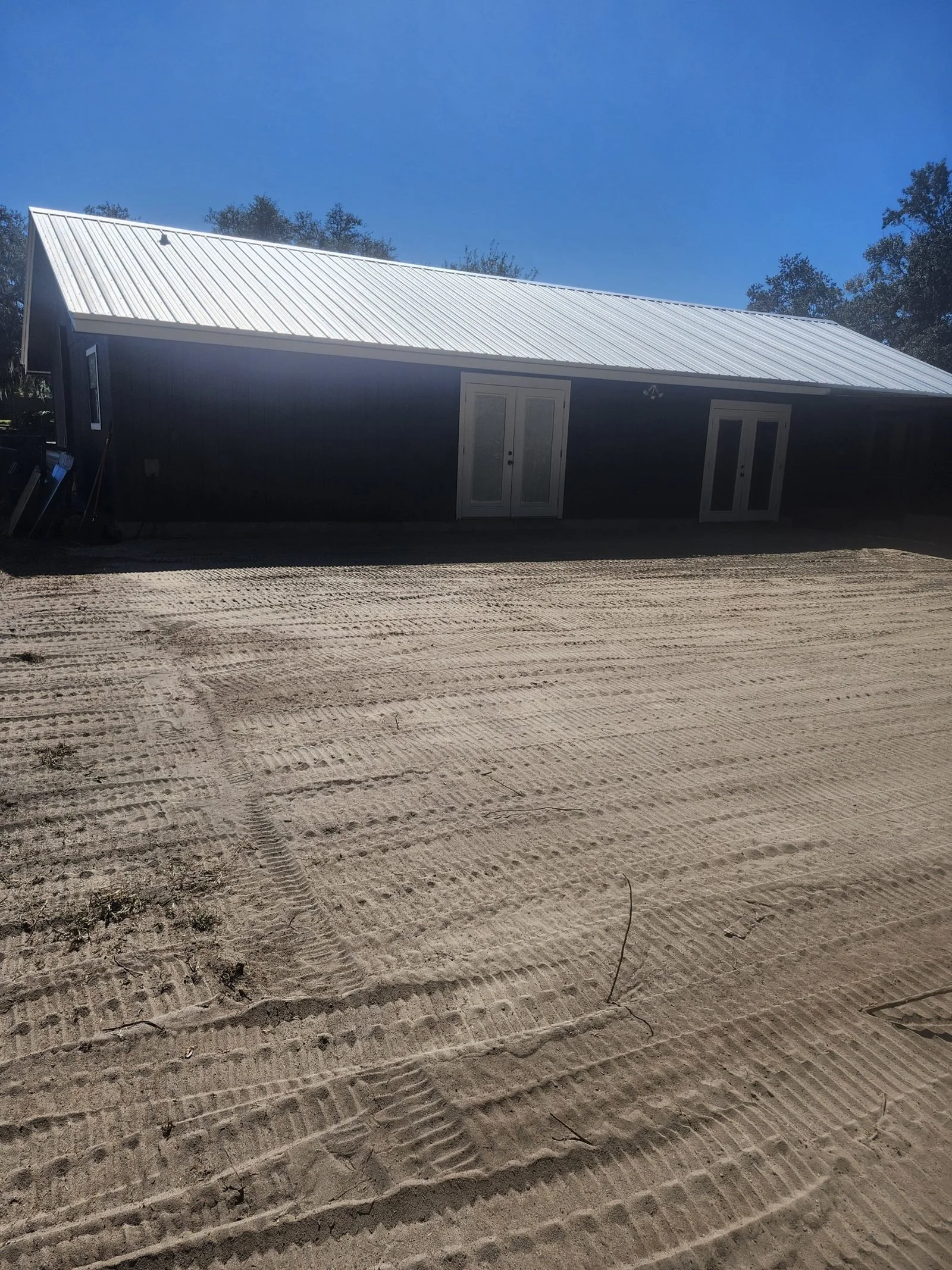 Polk Services yard after the in-ground pool was filled and graded.