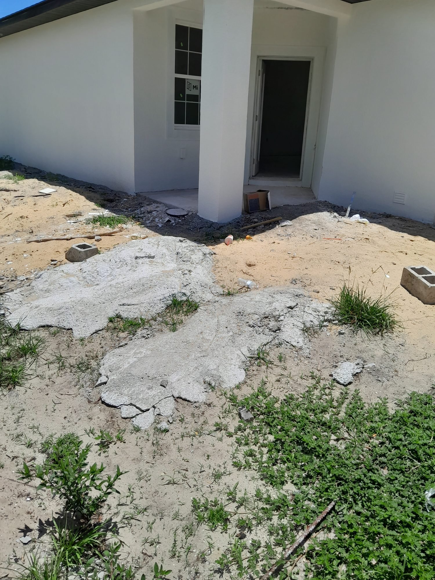 A Polk Services appliance pickup in progress at a Lakeland home.