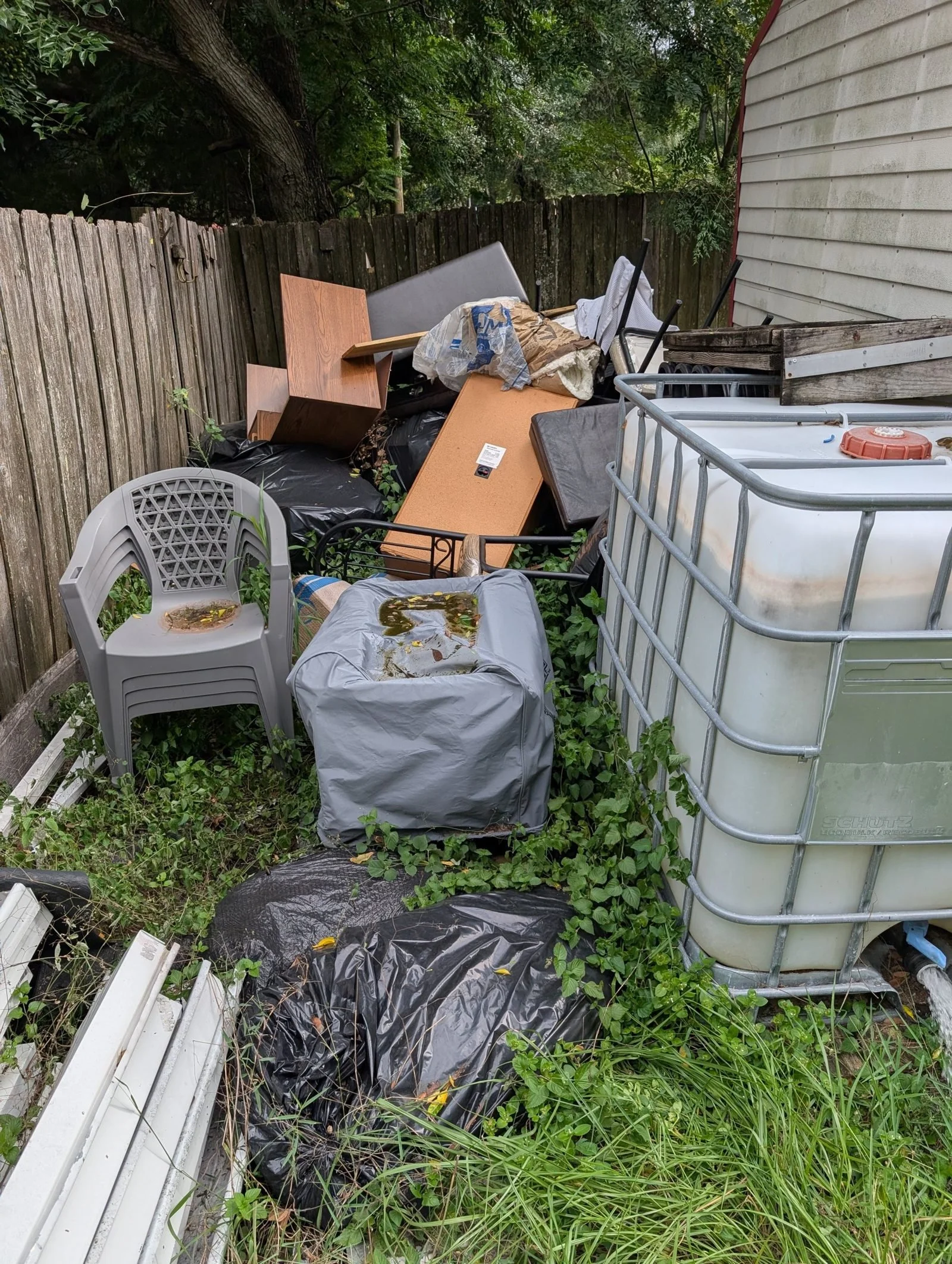 A Polk Services bedroom mattress pickup in progress.