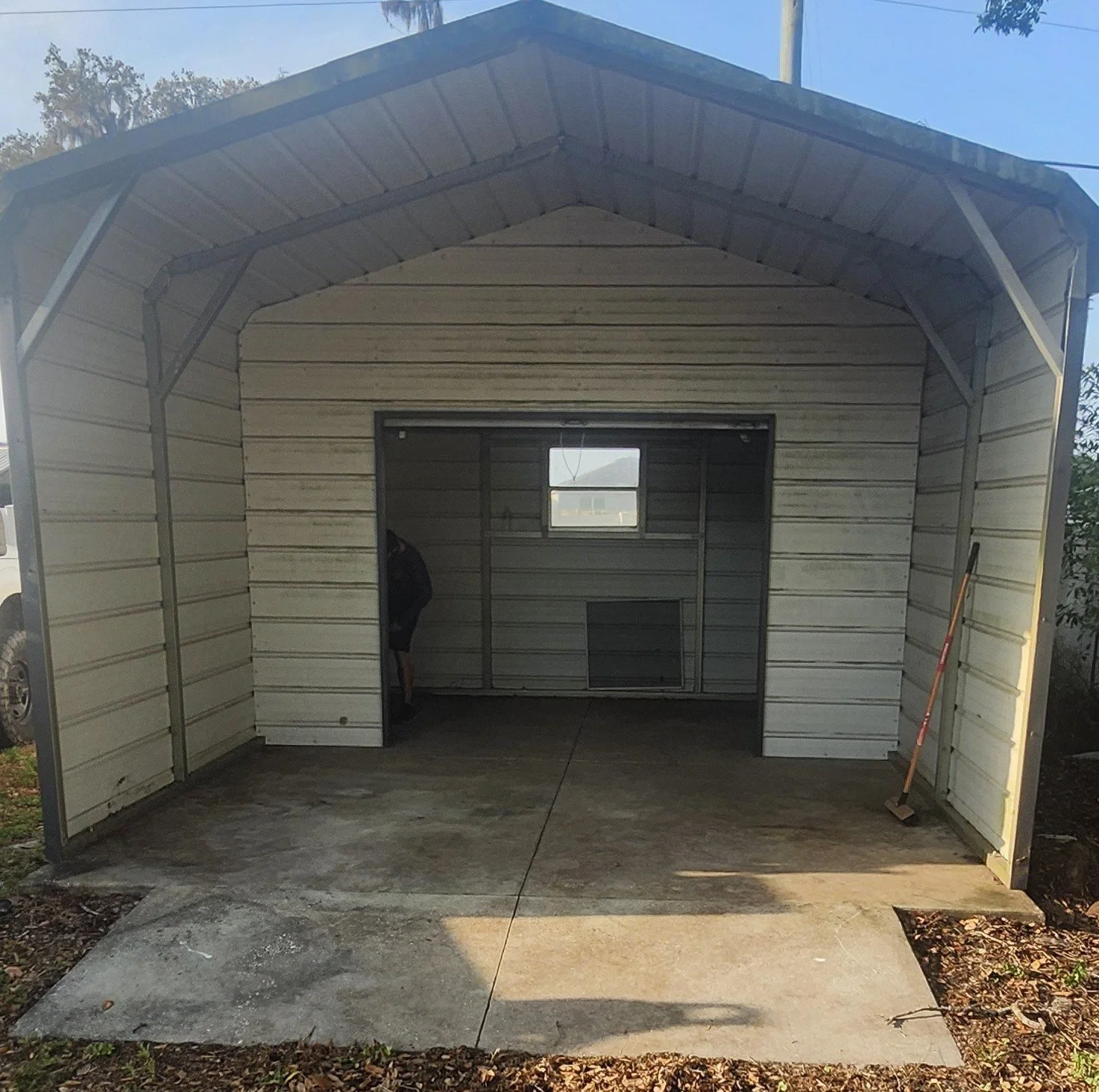 Cleared metal carport after Polk Services hauled everything out.