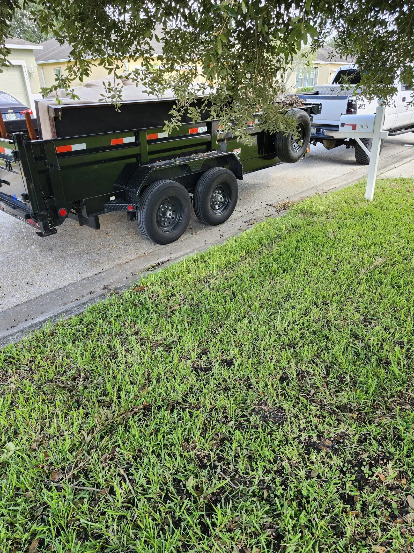 Polk Services truck and Kubota mini skid steer.
