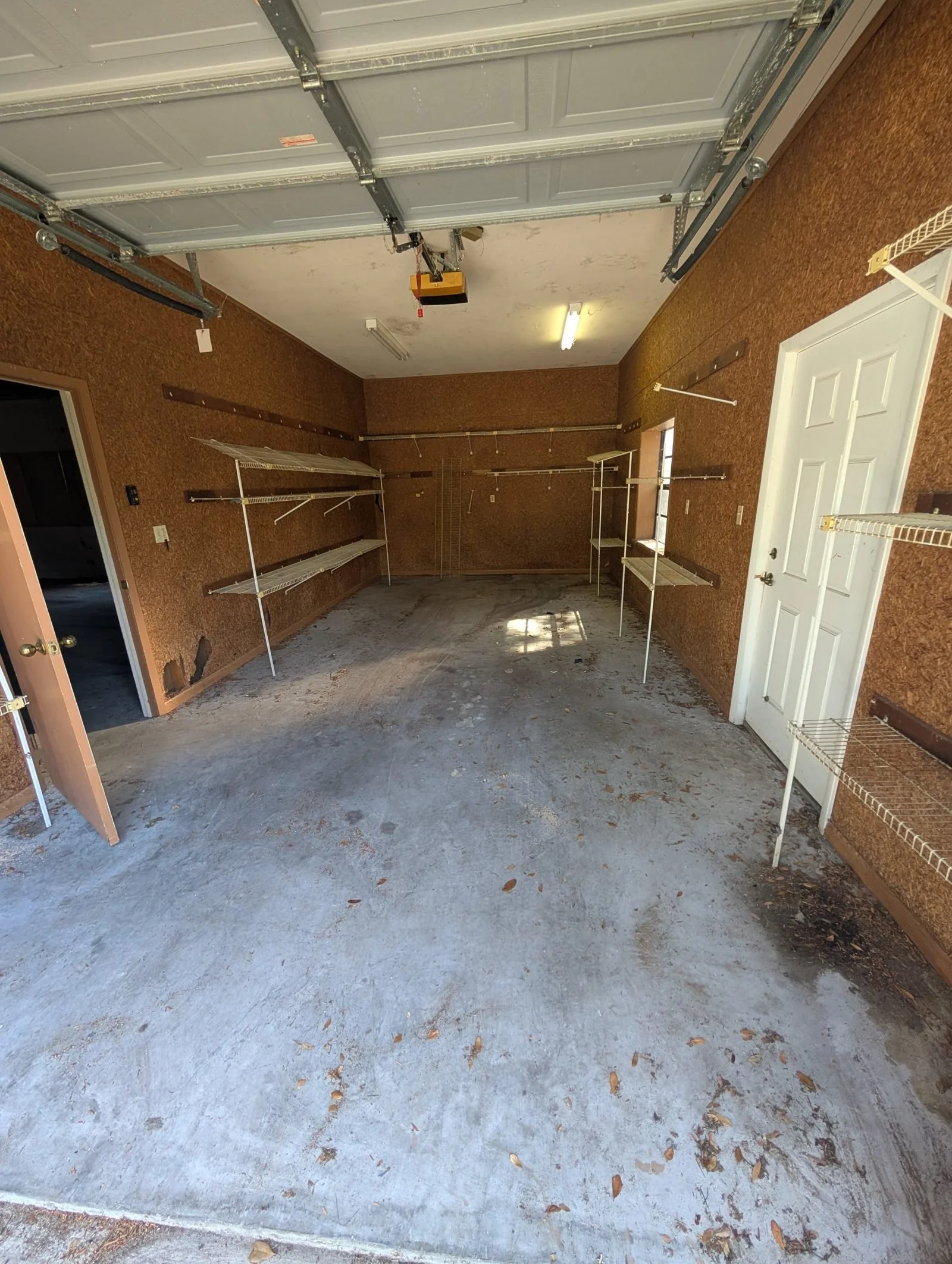 Empty, swept garage after a Polk Services garage cleanout in Polk County, FL.