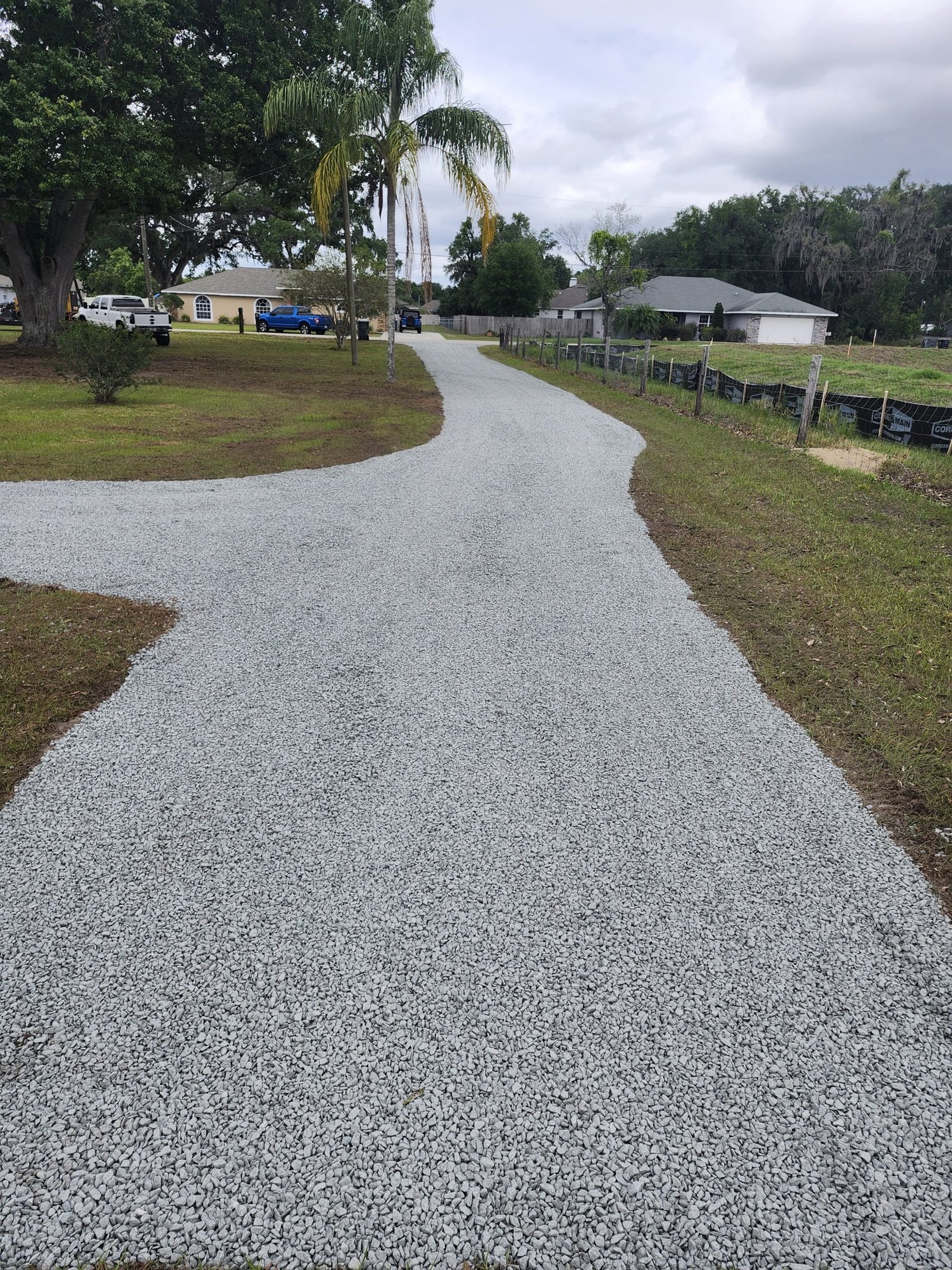 Finished Polk Services crushed-concrete driveway.