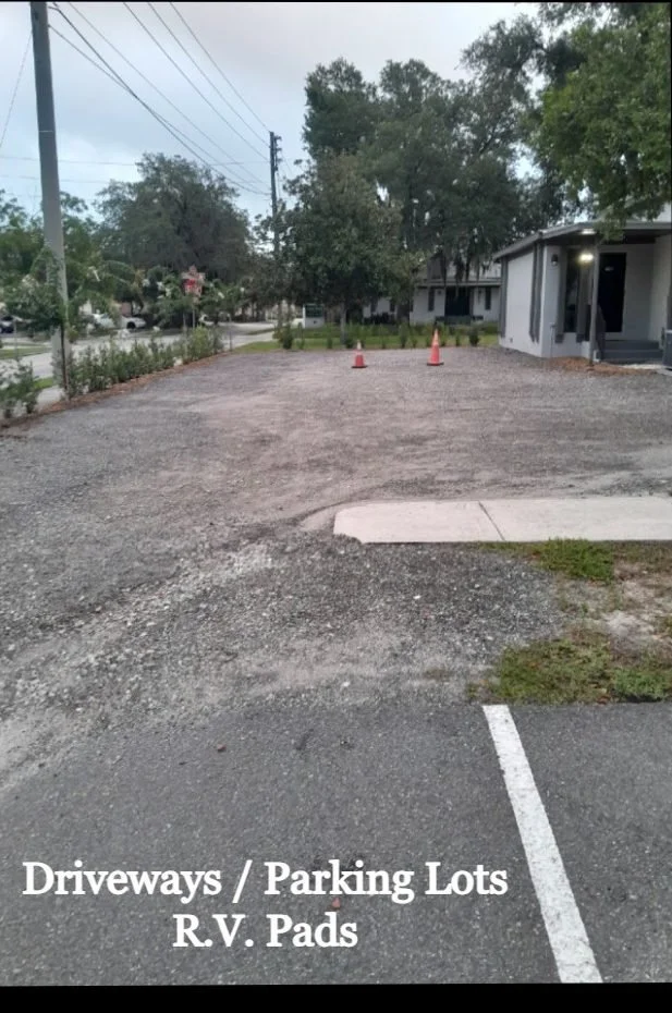 Bare dirt drive before the Polk Services crushed-asphalt install.