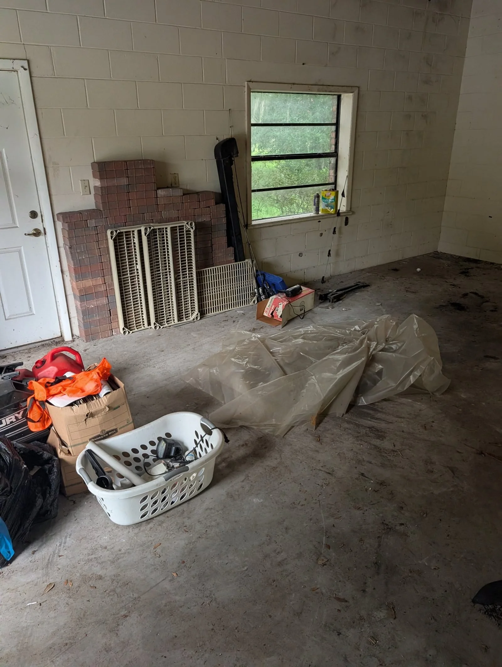 Polk Services foreclosure and REO cleanup in Lakeland, FL, overgrown bank-owned lot cleared.